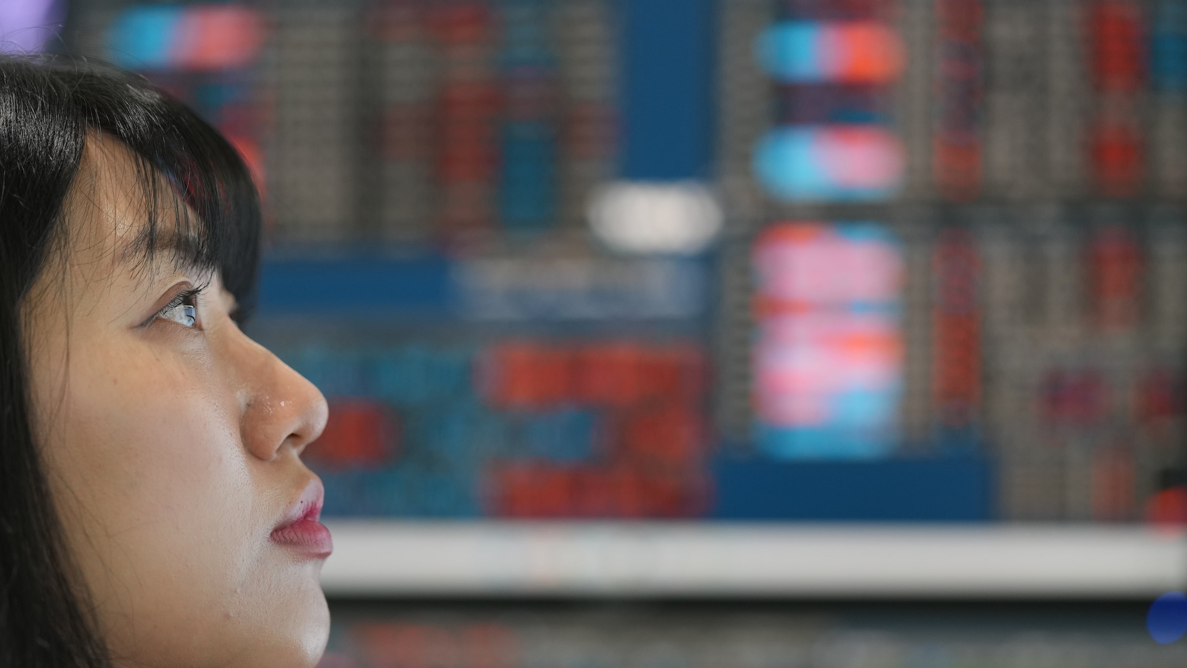 A dealer watches computer monitors at a dealing room of Hana Bank in Seoul, South Korea, Friday, May 15, 2026. (AP Photo/Lee Jin-man)