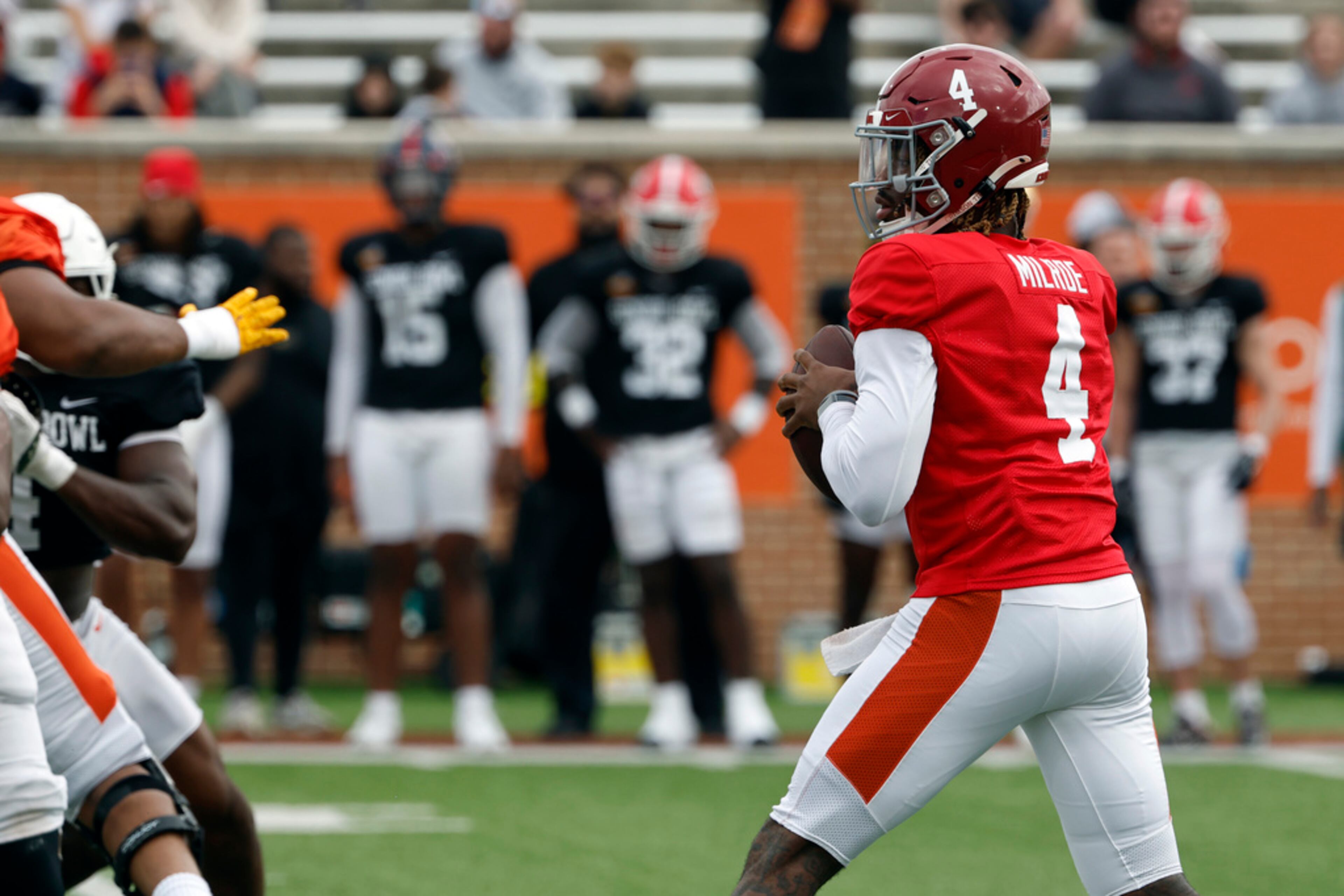 American team quarterback Jalen Milroe of Alabama (4) runs through drills during practice for the Senior Bowl NCAA college football game, Thursday, Jan. 30, 2025, in Mobile, Ala. (AP Photo/Butch Dill)