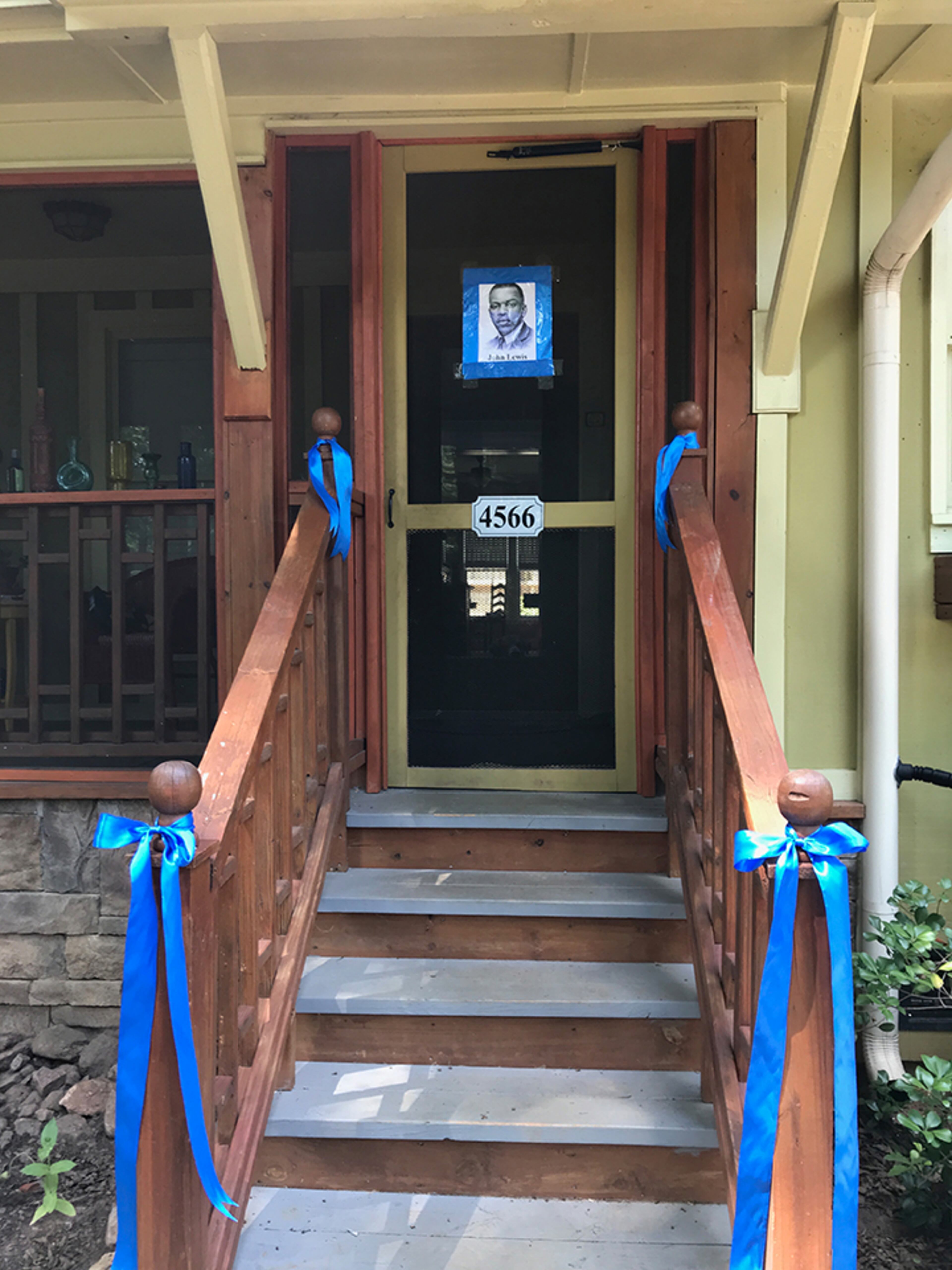 Blue ribbons and a photo of John Lewis on my front door to commemorate my hero, John Lewis. - Wendy Keith-Ott