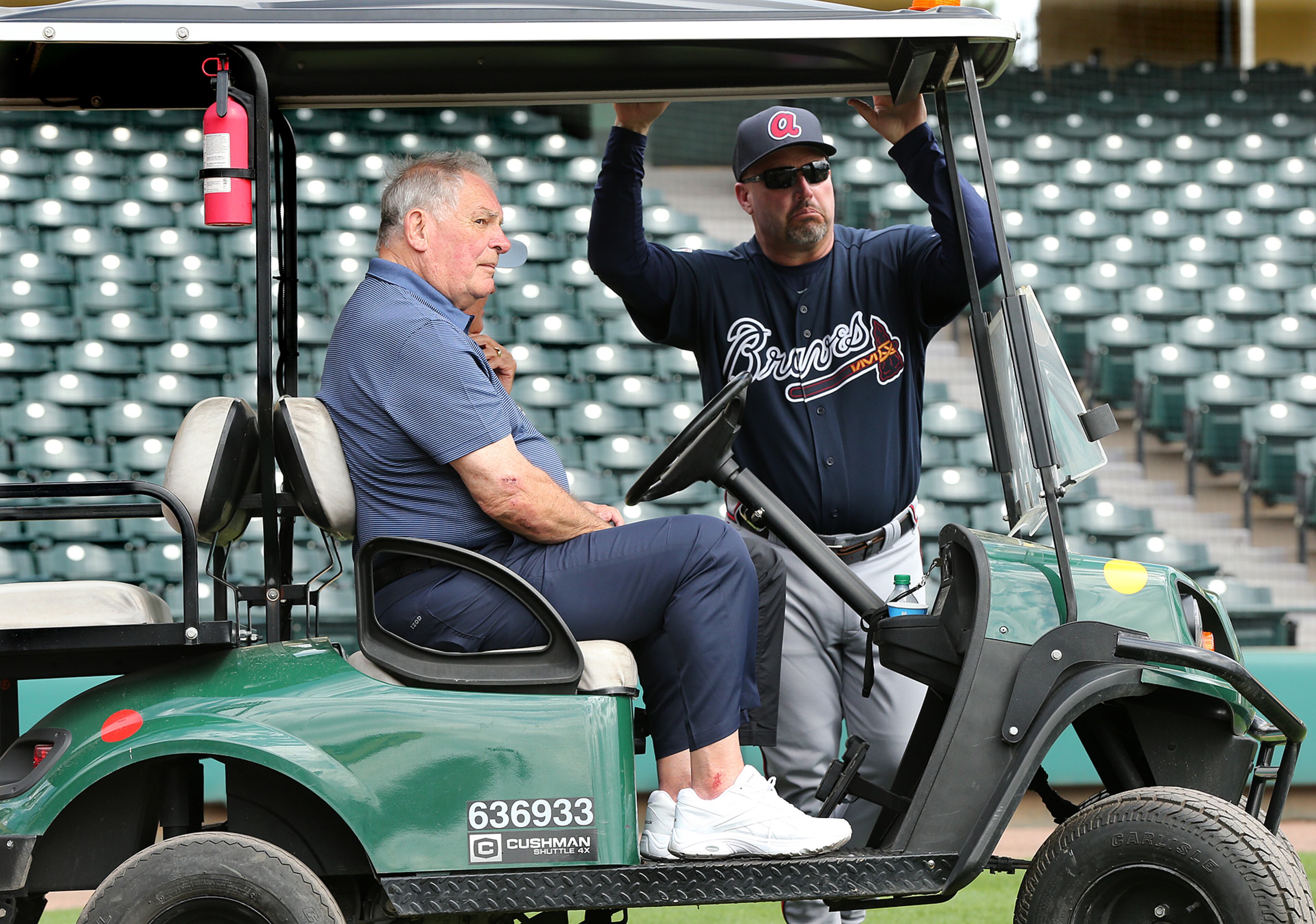 Former Braves manager Bobby Cox (left) and manager Fredi Gonzalez watch batting practice in Champion Stadium on Tuesday, Feb 23, 2016, at the ESPN Wide World of Sports, Lake Buena Vista, Fla. Curtis Compton / ccompton@ajc.com