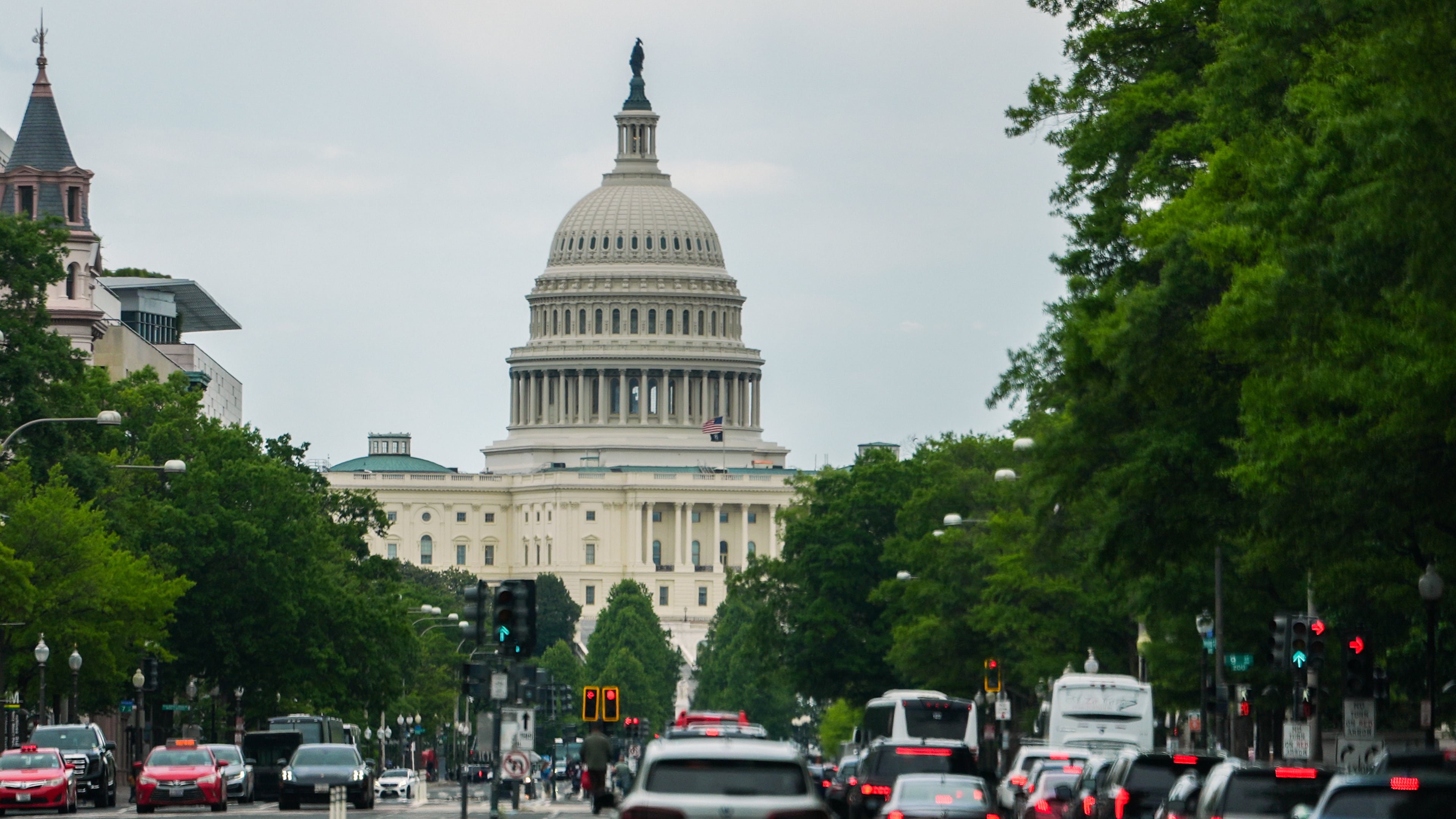 The U.S. Capitol is seen as cars drive on Pennsylvania Avenue, during rush hour, Wednesday, May 13, 2026, in Washington. (AP Photo/Julia Demaree Nikhinson)