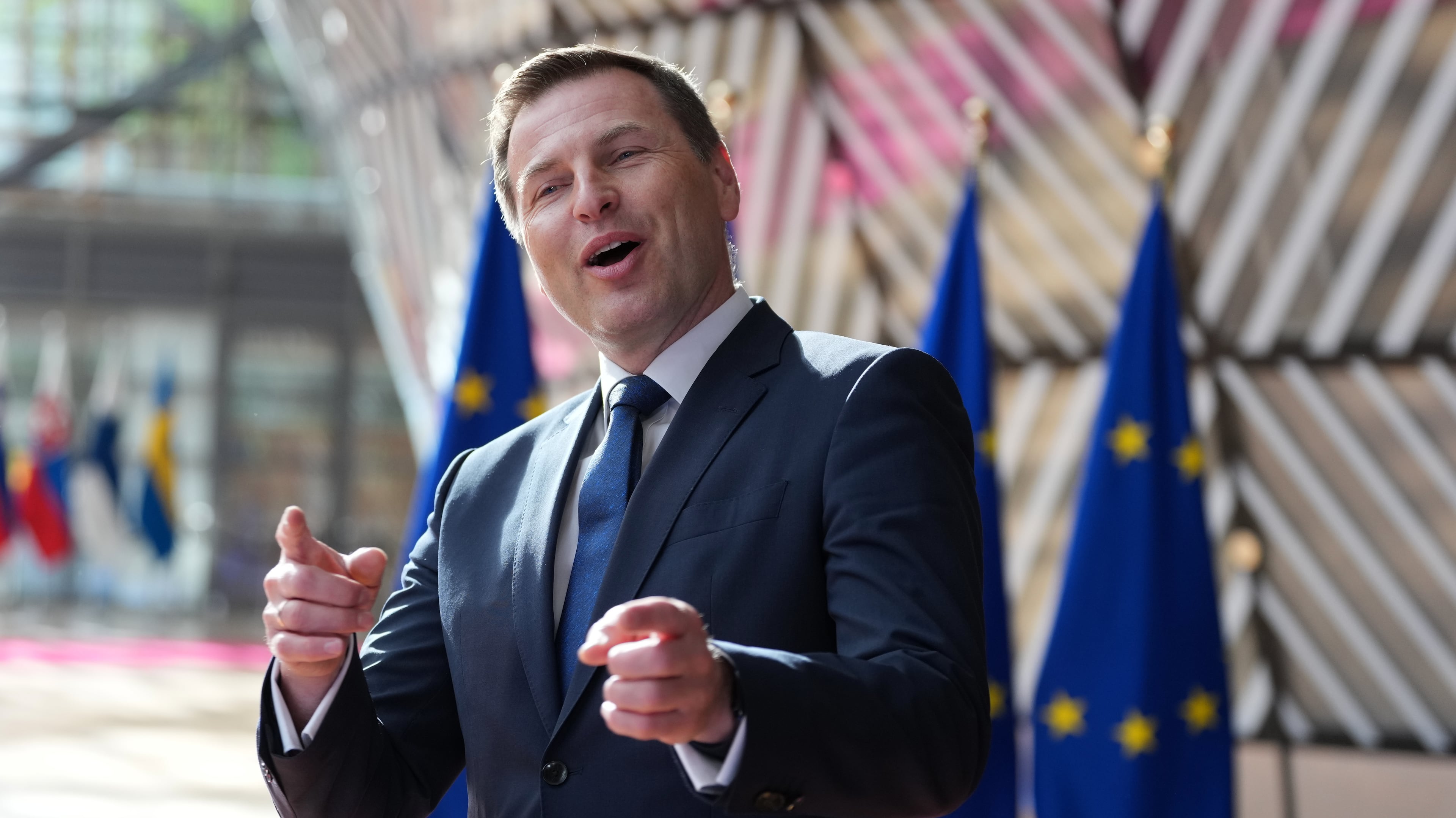 Estonia's Defense Minister Hanno Pevkur speaks with the media as he arrives for a meeting of EU defense ministers at the European Council building in Brussels, Tuesday, May 12, 2026. (AP Photo/Virginia Mayo)
