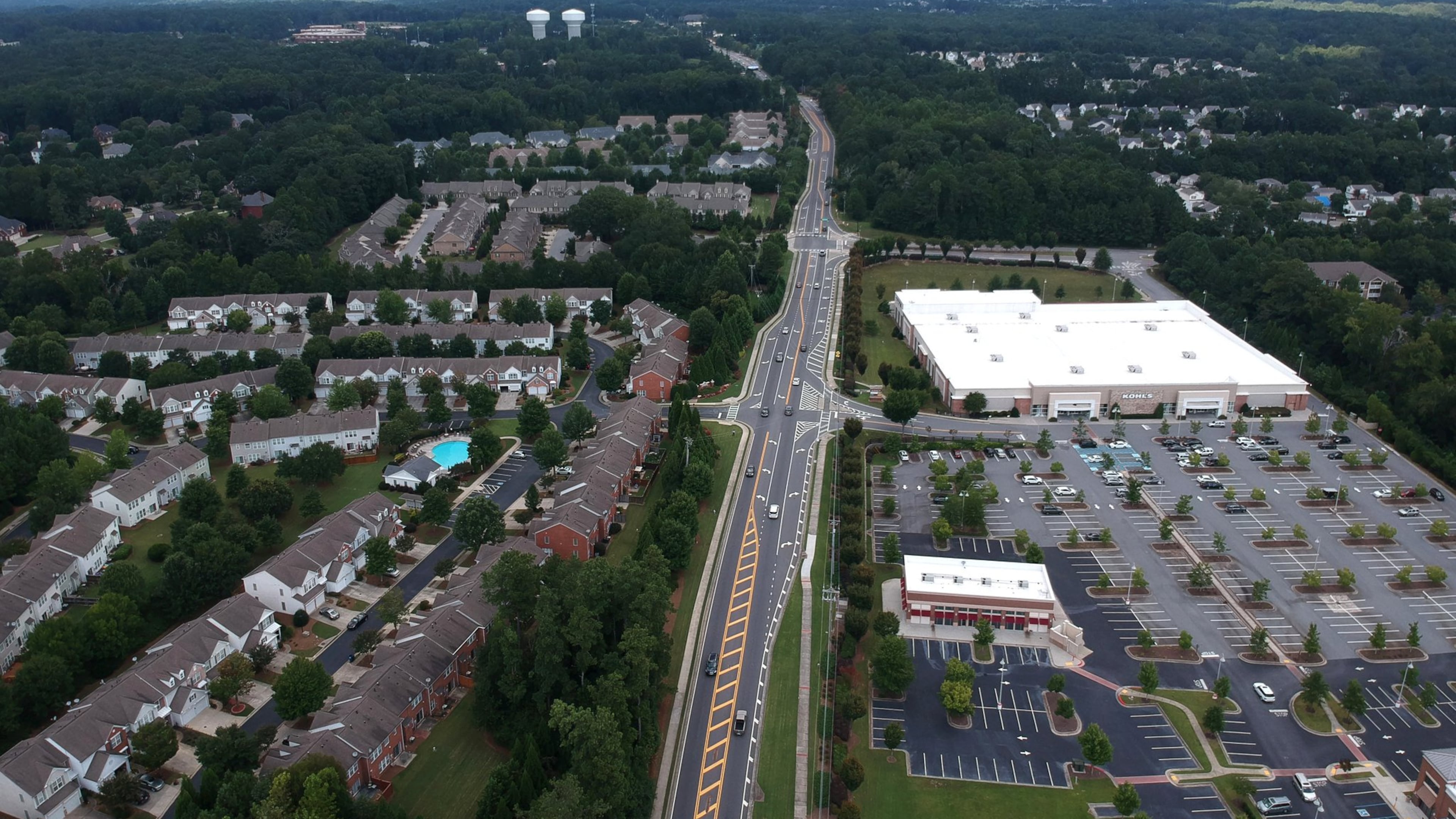 Aerial view of SR 9 (center) and Regency at Windward Square subdivision (foreground left) in Milton. Ike Yancy is the homeowners association president in Regency at Windward Square. He and other residents are happy with a compromise made with the Georgia Department of Transportation that will keep their landscaping during a road widening project on Ga. 9. HYOSUB SHIN / HSHIN@AJC.COM AJC FILE PHOTO