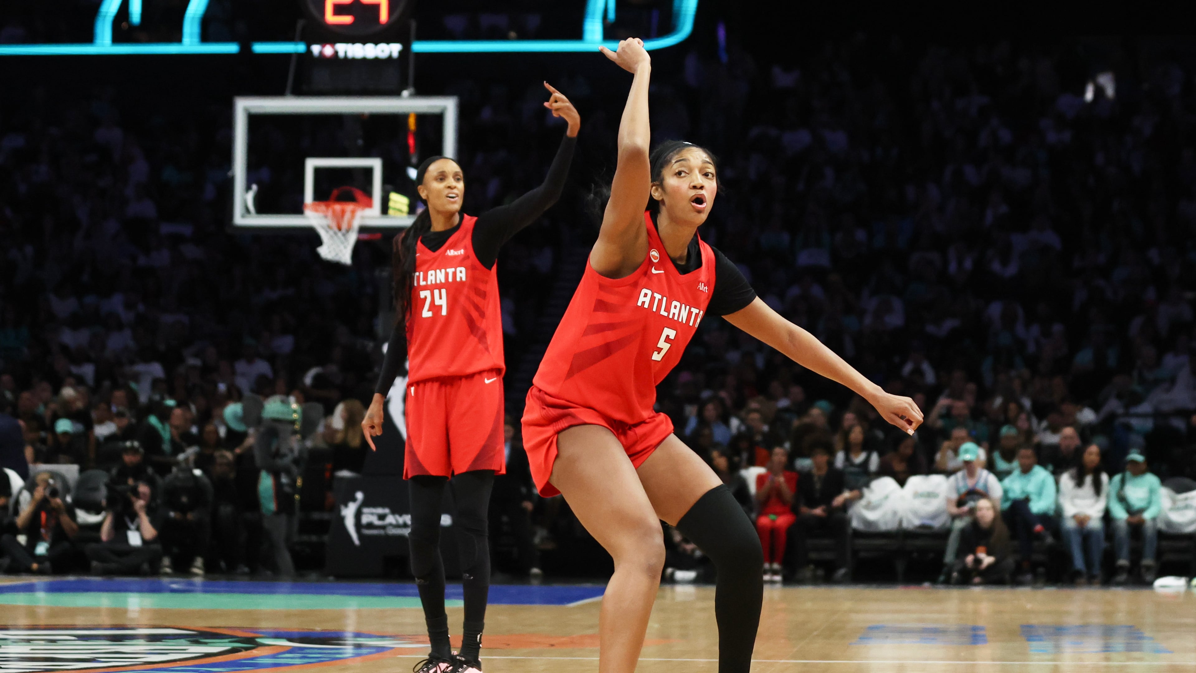Atlanta Dream forward Angel Reese (5) and DeWanna Bonner (24) ask for a review during the second half of Game 3 of the WNBA basketball semifinals against the New York Liberty, Friday, Oct. 9, 2026, in New York. (AP Photo/Heather Khalifa)
