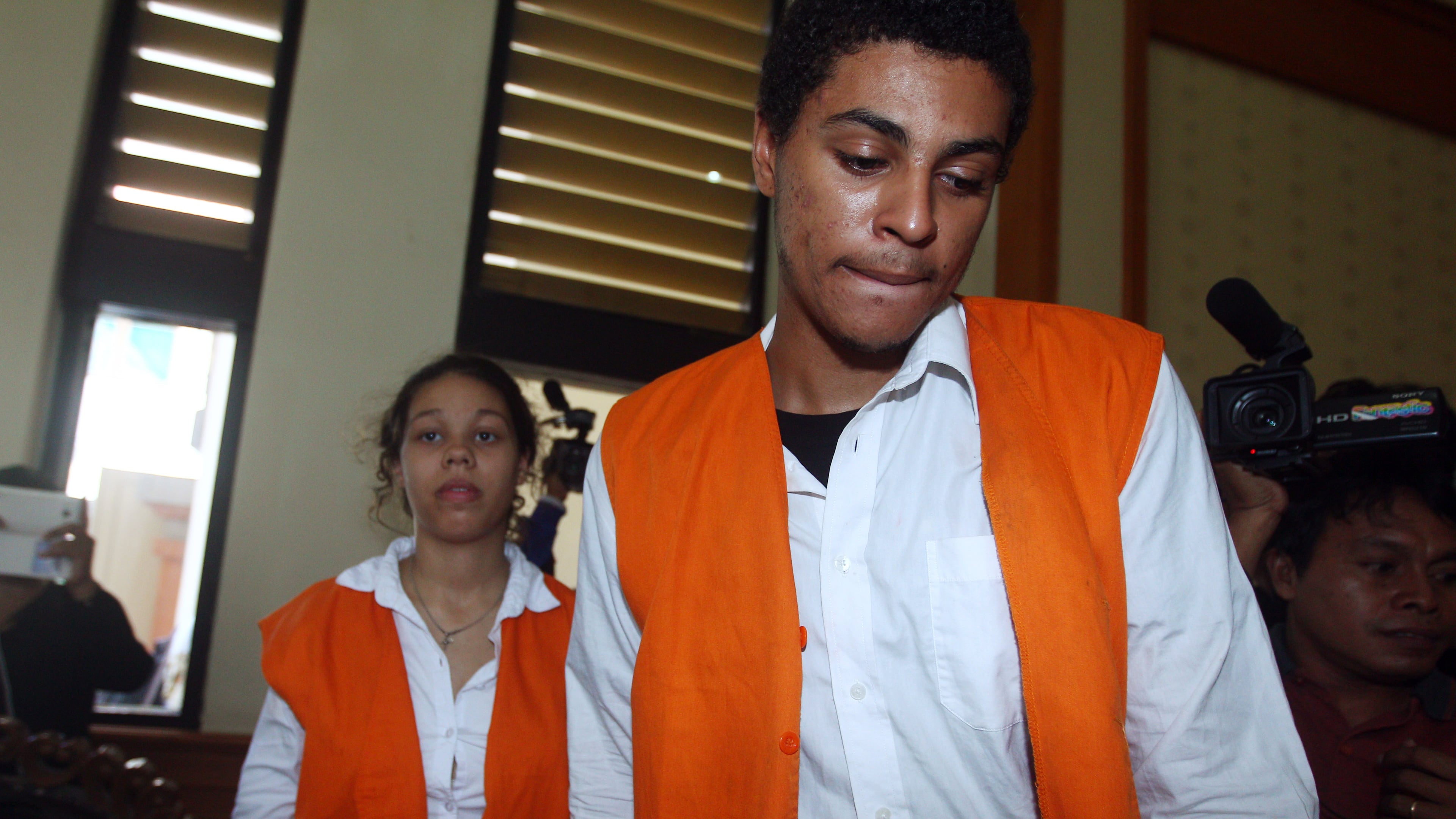 FILE - Tommy Schaefer, right, and Heather Mack, both of Chicago, Ill., arrive for their trial at Denpasar's district court in Bali, Indonesia, Thursday, April 9, 2015. (AP Photo/Firdia Lisnawati, File)