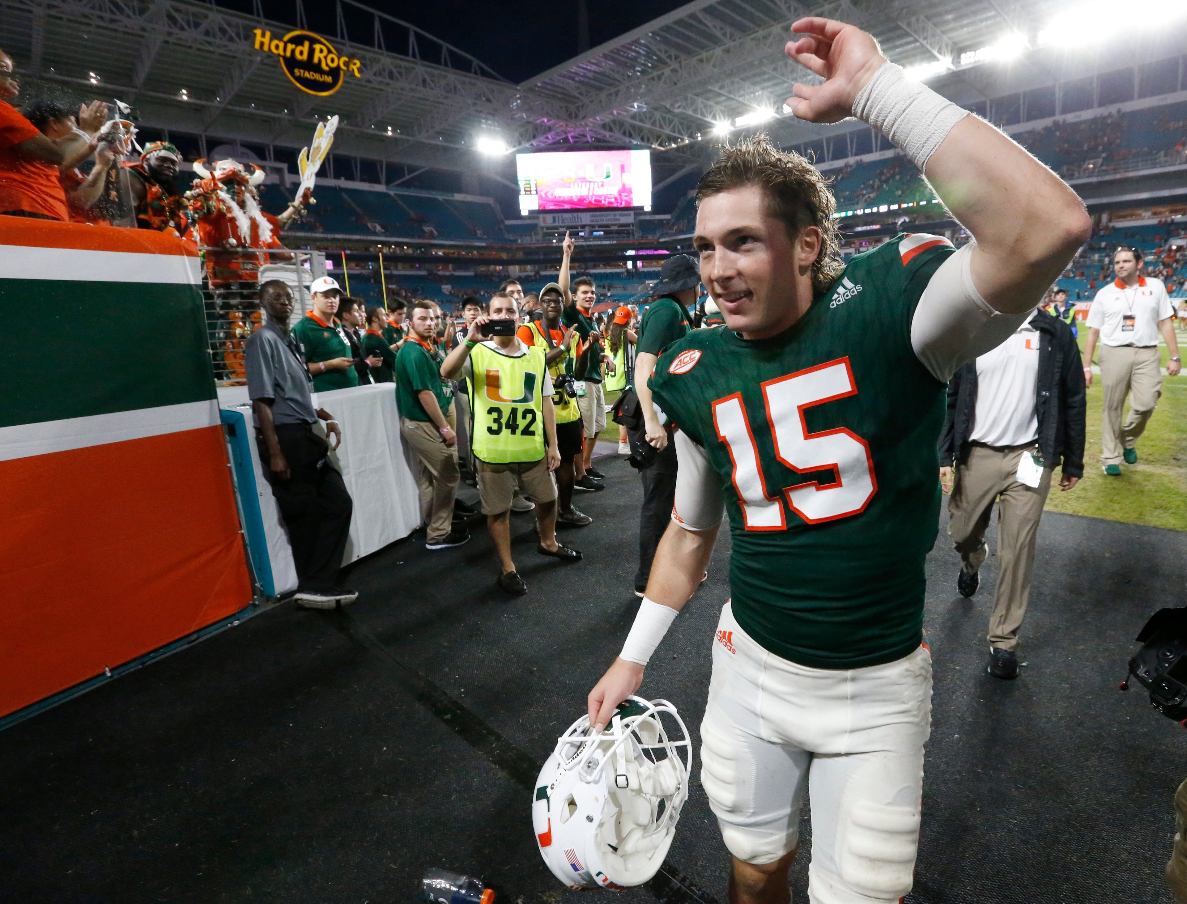 Miami place kicker Michael Badgley (15) waves to the crowd as he leaves the field after Miami defeated Georgia Tech 25-24 in an NCAA College football game, Saturday, Oct. 14, 2017 in Miami Gardens, Fla. (AP Photo/Wilfredo Lee)