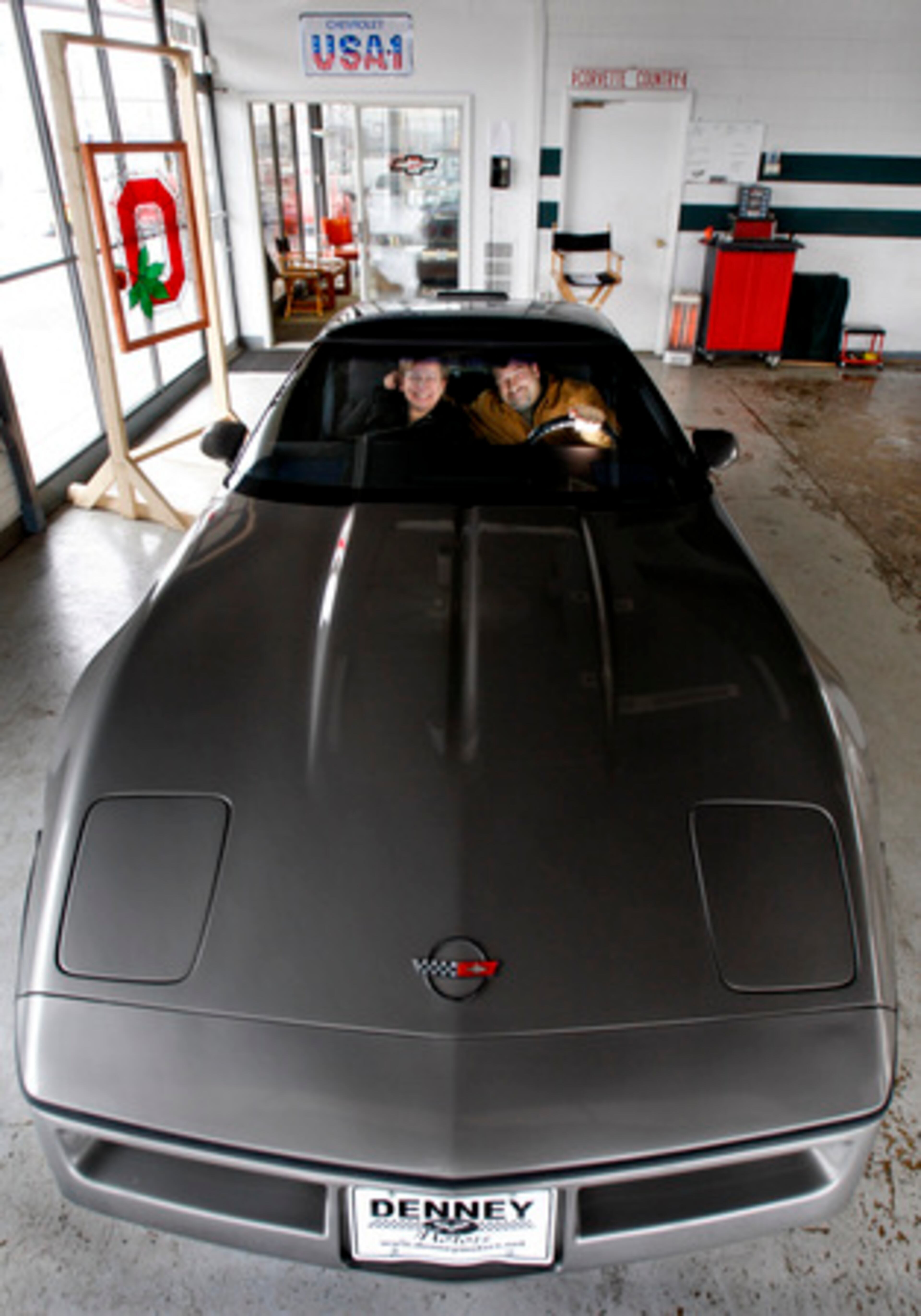 1986 Corvette: Carol and Jerry Apicella Jr. sit in the 1986 Corvette in Columbus, Ohio, that they owned twenty years ago. The couple repurchased the car from Denney Motors in Columbus after finding it on the web. Apicella Jr., 46, says the car has aged better than he has.