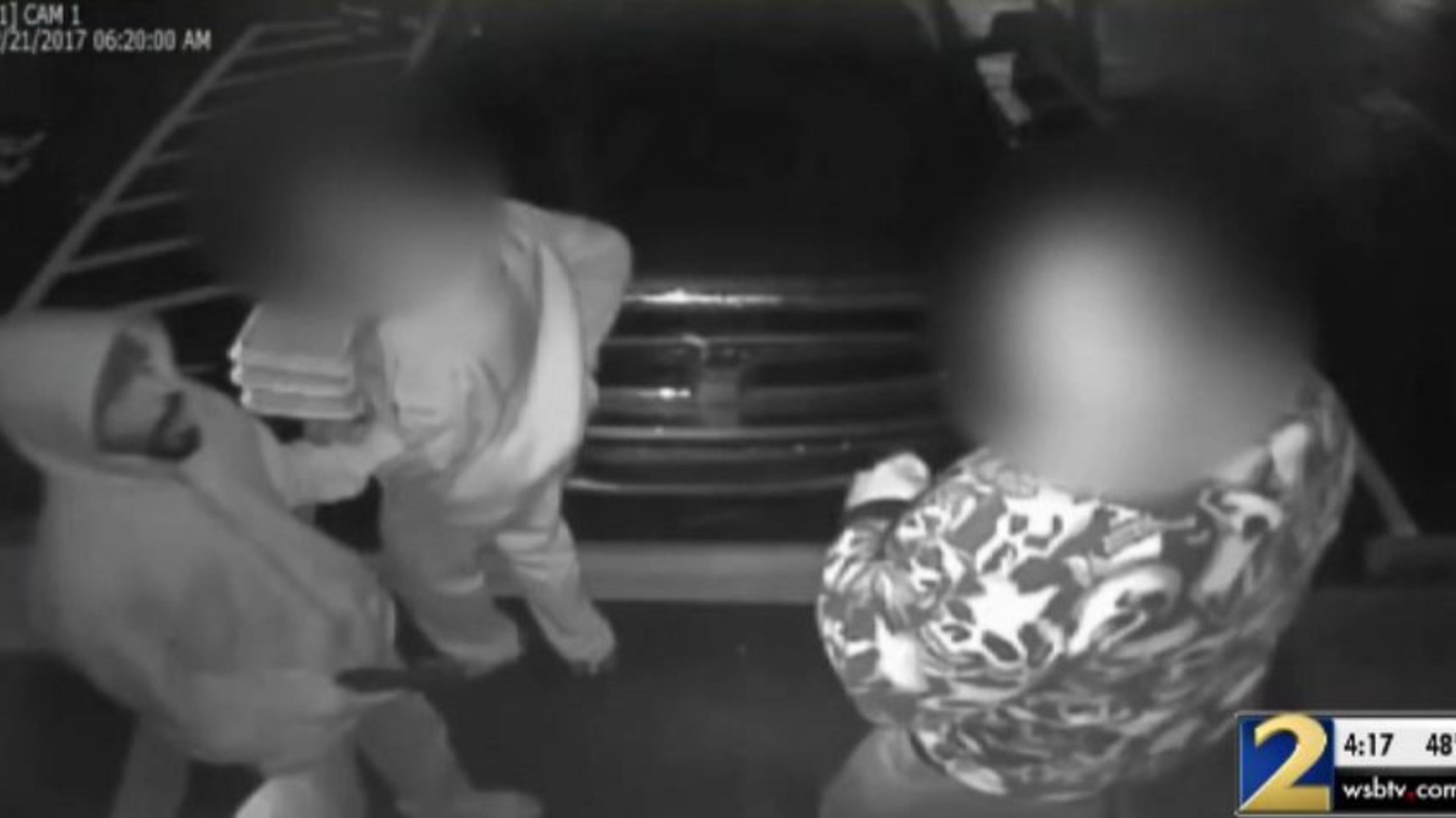Surveillance video shows the man (left), who police say robbed the Rumors gentleman’s club in Forest Park.