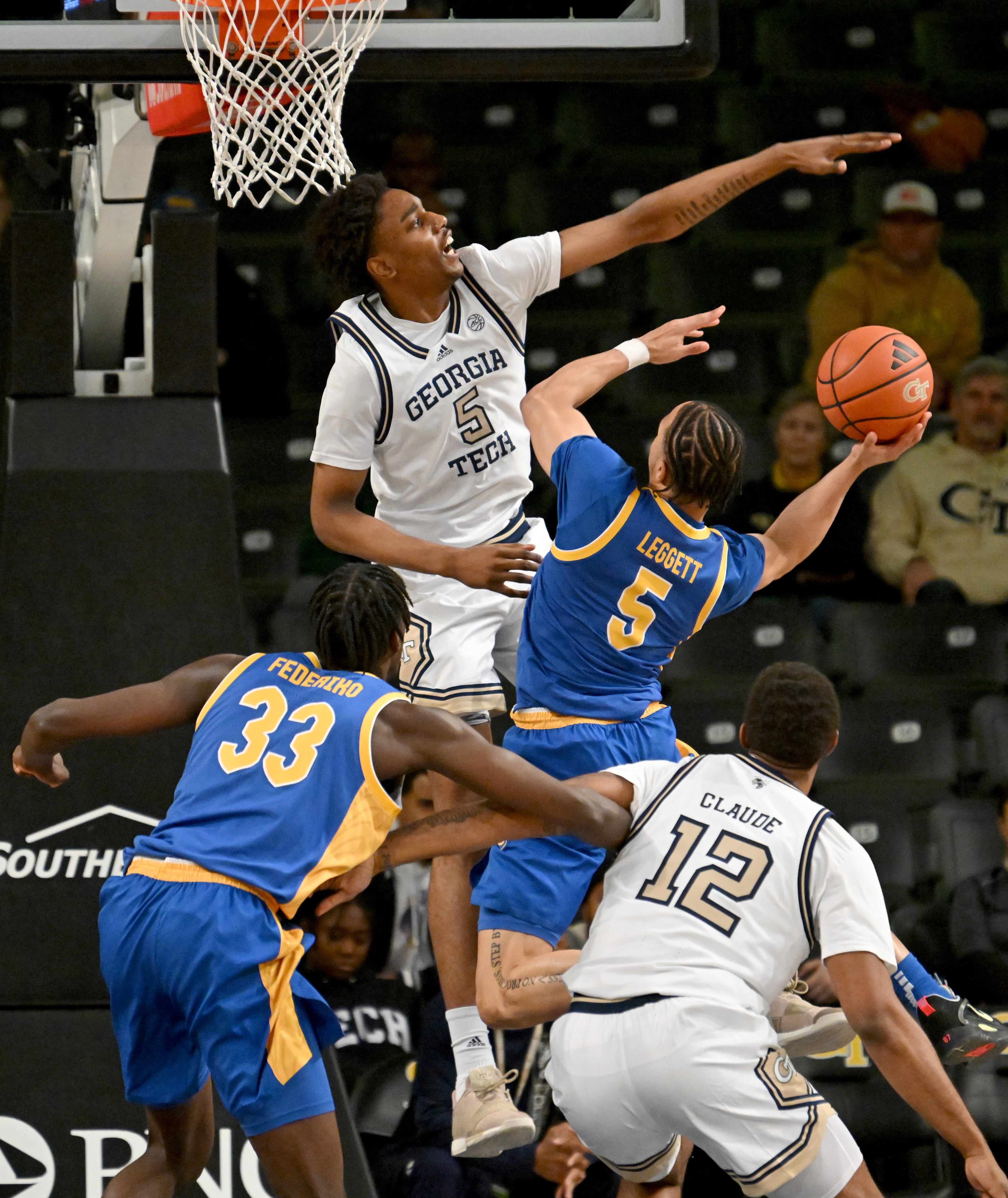 Georgia Tech forward Tafara Gapare (5) blocks a shot by Pittsburgh guard Ishmael Leggett (5) during the first half of an NCAA college basketball game at Georgia Tech’s McCamish Pavilion, Tuesday, January 23, 2024, in Atlanta. (Hyosub Shin / Hyosub.Shin@ajc.com)