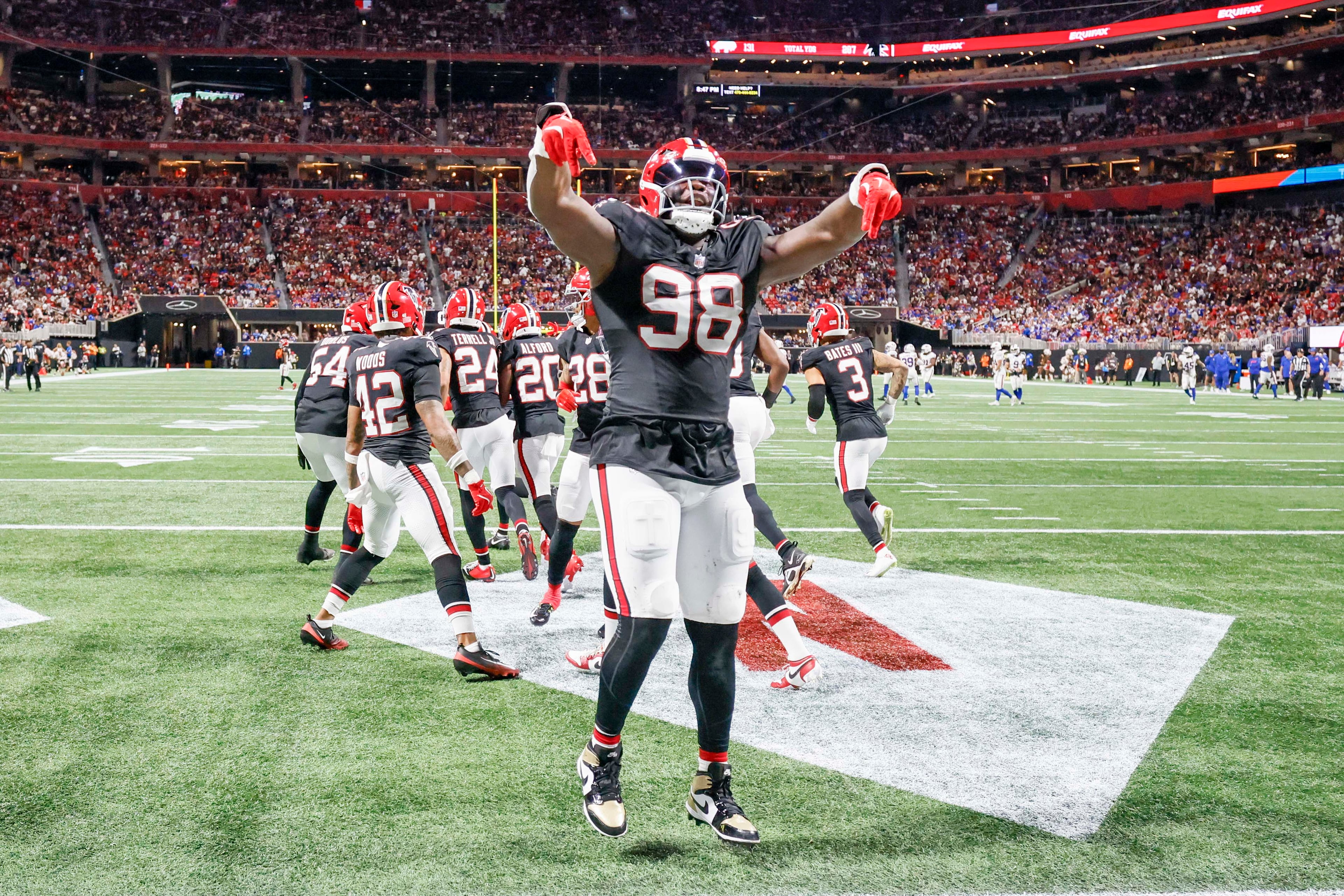 Atlanta Falcons defensive tackle Ruke Orhorhoro (98) racts after a play during the second half of an NFL football game against the Buffalo Bills at Mercedes-Benz Stadium in Atlanta on Monday, October 13, 2025.
(Miguel Martinez/ AJC)