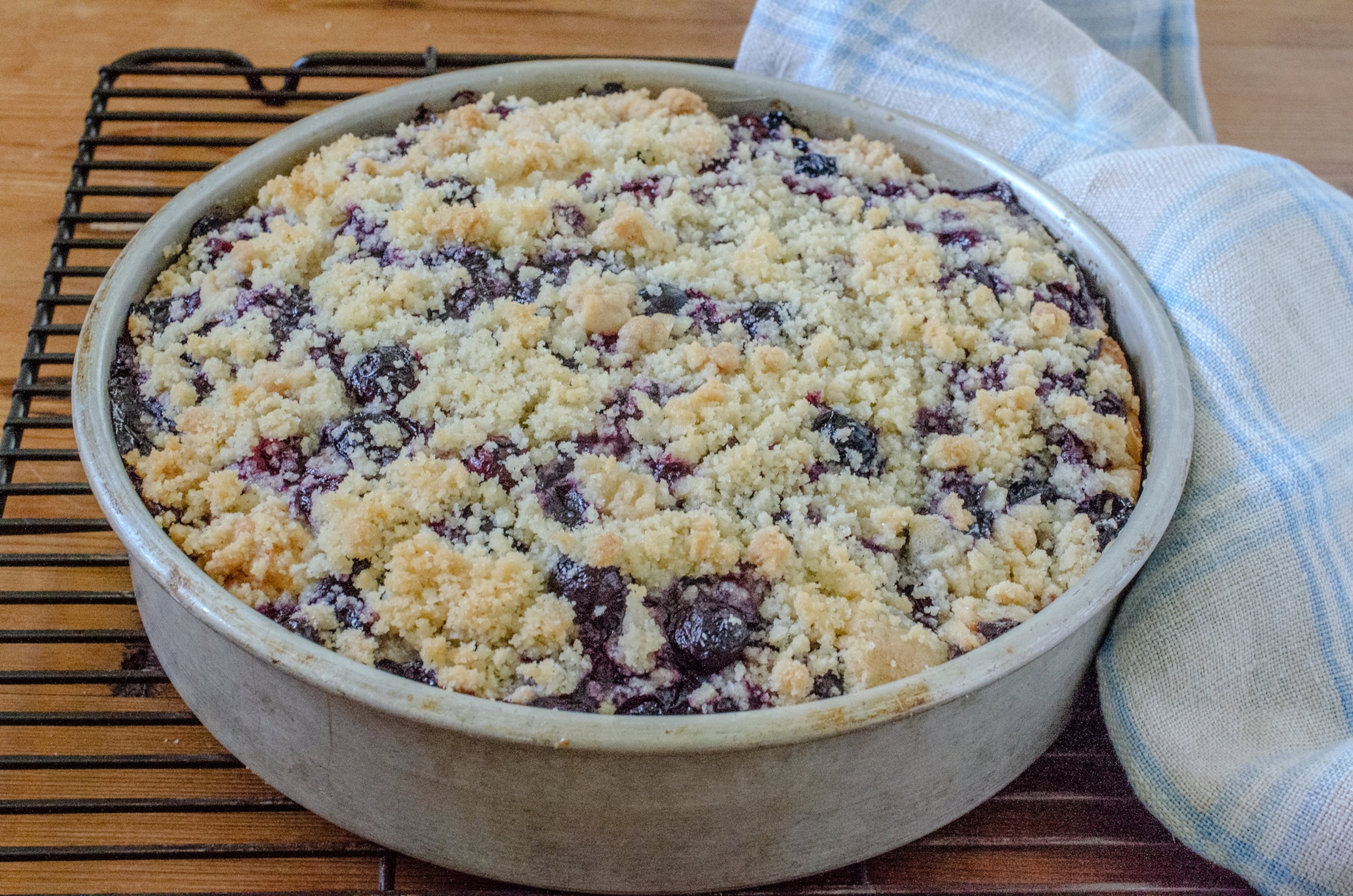 This Blueberry Buckle has a layer of sweet berries and is topped with a golden brown streusel. (Virginia Willis for the AJC)
