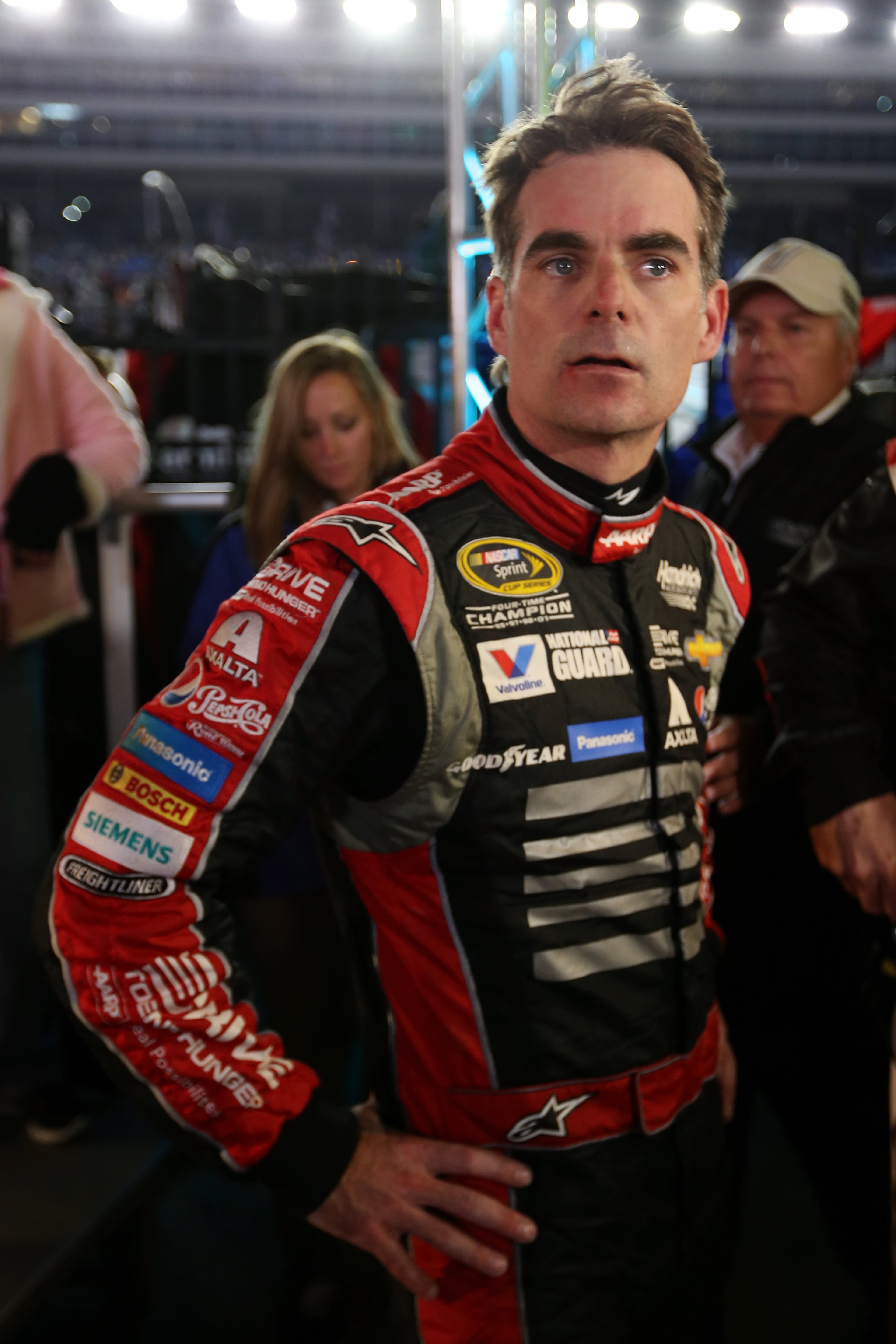 FORT WORTH, TX - NOVEMBER 02: Jeff Gordon, driver of the #24 Drive To End Hunger Chevrolet, reacts after being involved in a fight with Brad Keselowski, driver of the #2 Miller Lite Ford, at the conclusion of the NASCAR Sprint Cup Series AAA Texas 500 at Texas Motor Speedway on November 2, 2014 in Fort Worth, Texas. (Photo by Todd Warshaw/Getty Images for Texas Motor Speedway)