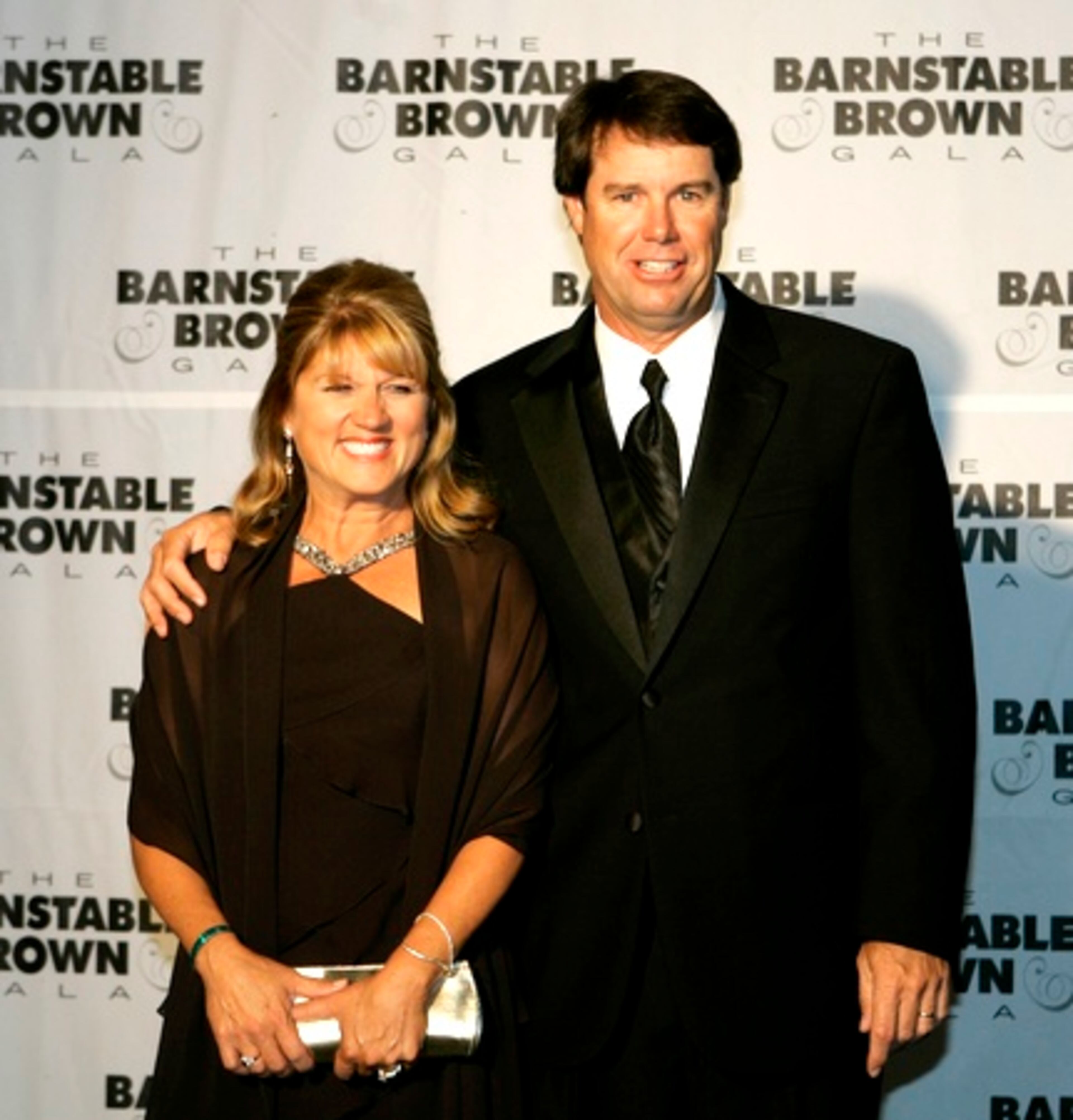 U.S. Ryder Cup caption Paul Azinger with his wife, Toni, arrive at the Barnstable Brown Derby party.