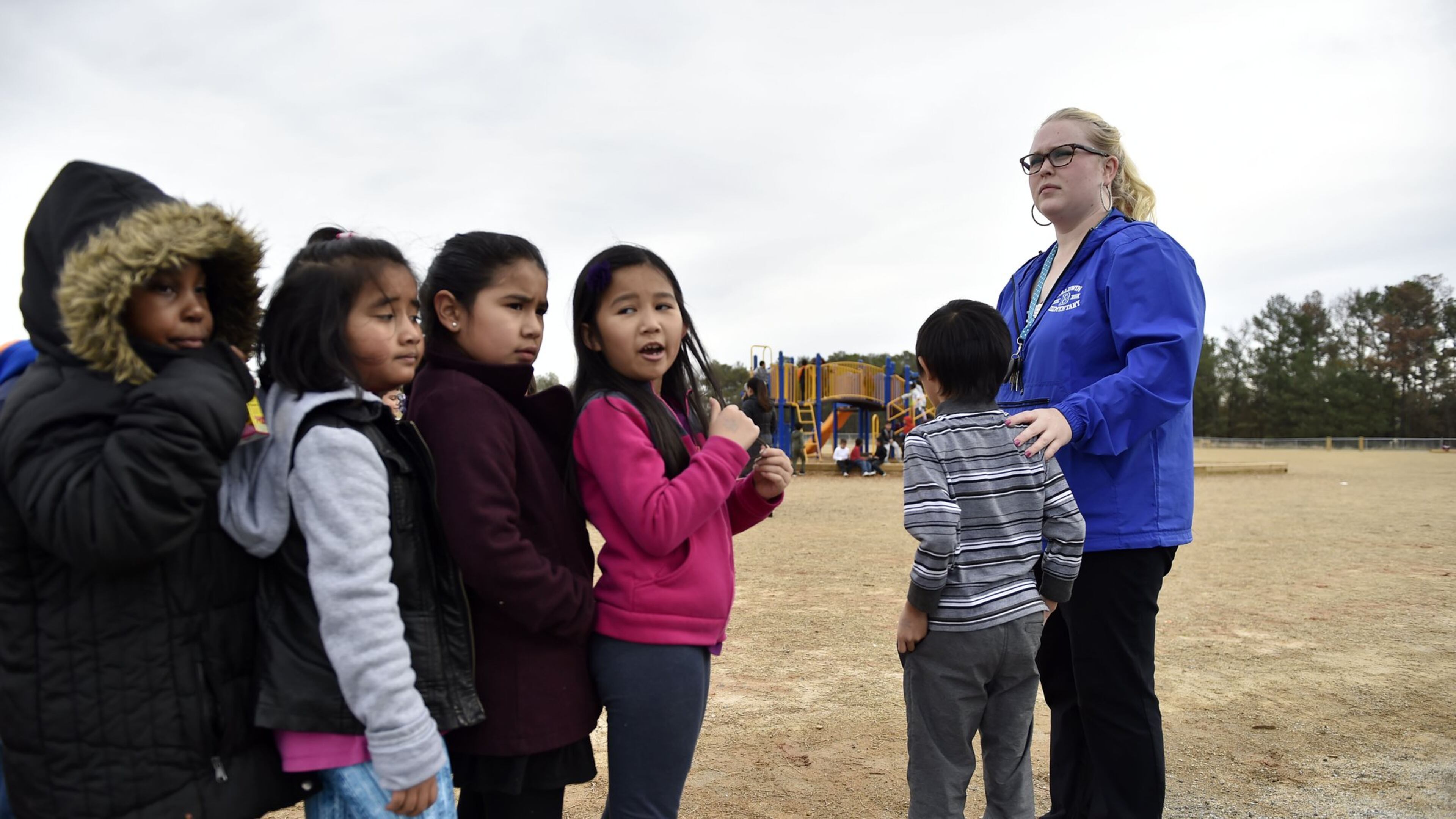 December 14, 2016, Norcross - Audrey Smith, 25, a first grade teacher at Baldwin Elementary School, brings her class back inside after recess in Norcross, Georgia, on Wednesday, December 14, 2016. Despite never having taught her own class before this year, Smith leads like a veteran teacher. (DAVID BARNES / DAVID.BARNES@AJC.COM)