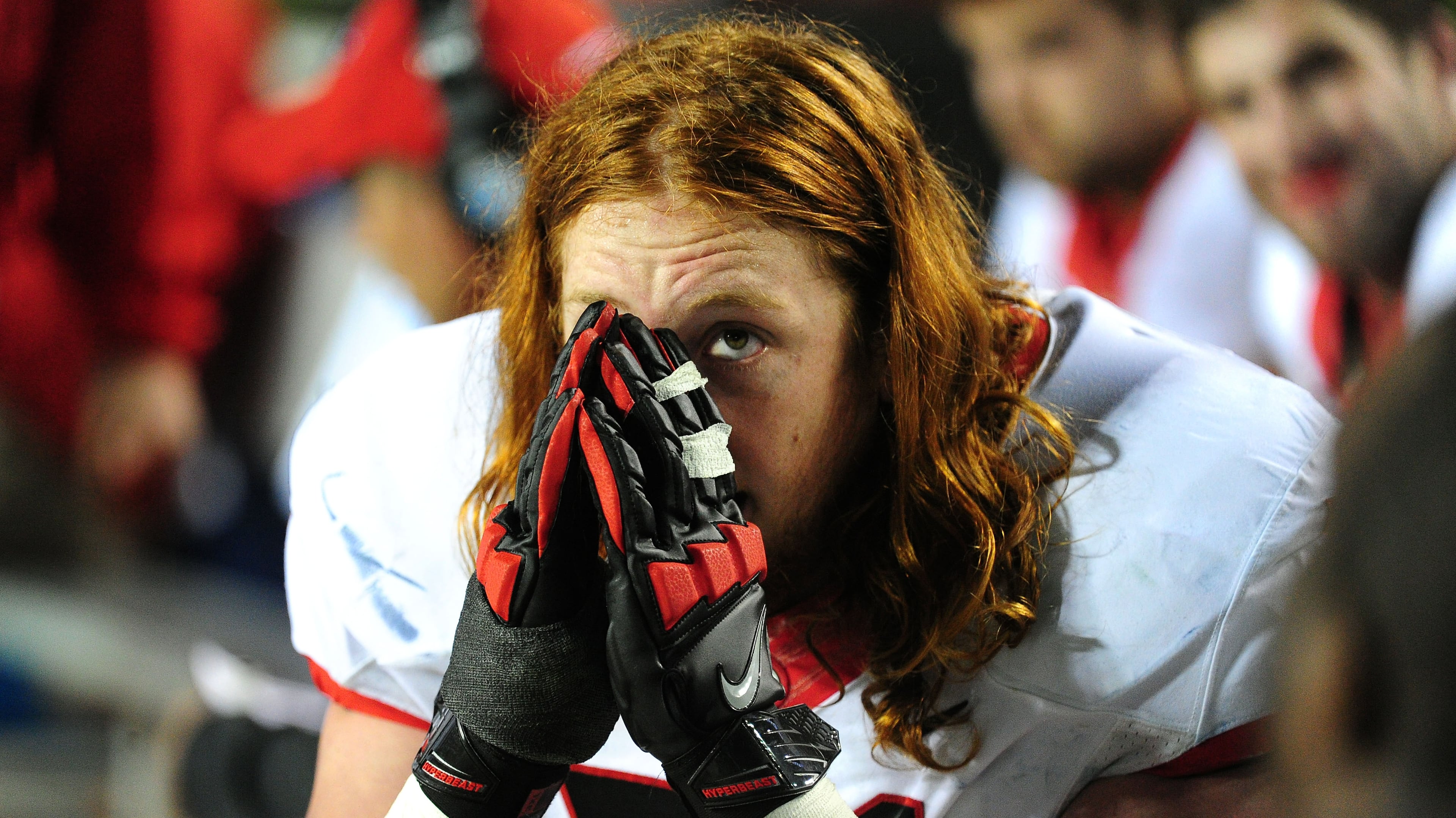 Former Georgia offensive lineman John Theus watches the clock late in the game against the Auburn Tigers Nov. 16, 2013, at Jordan-Hare Stadium in Auburn Ala.