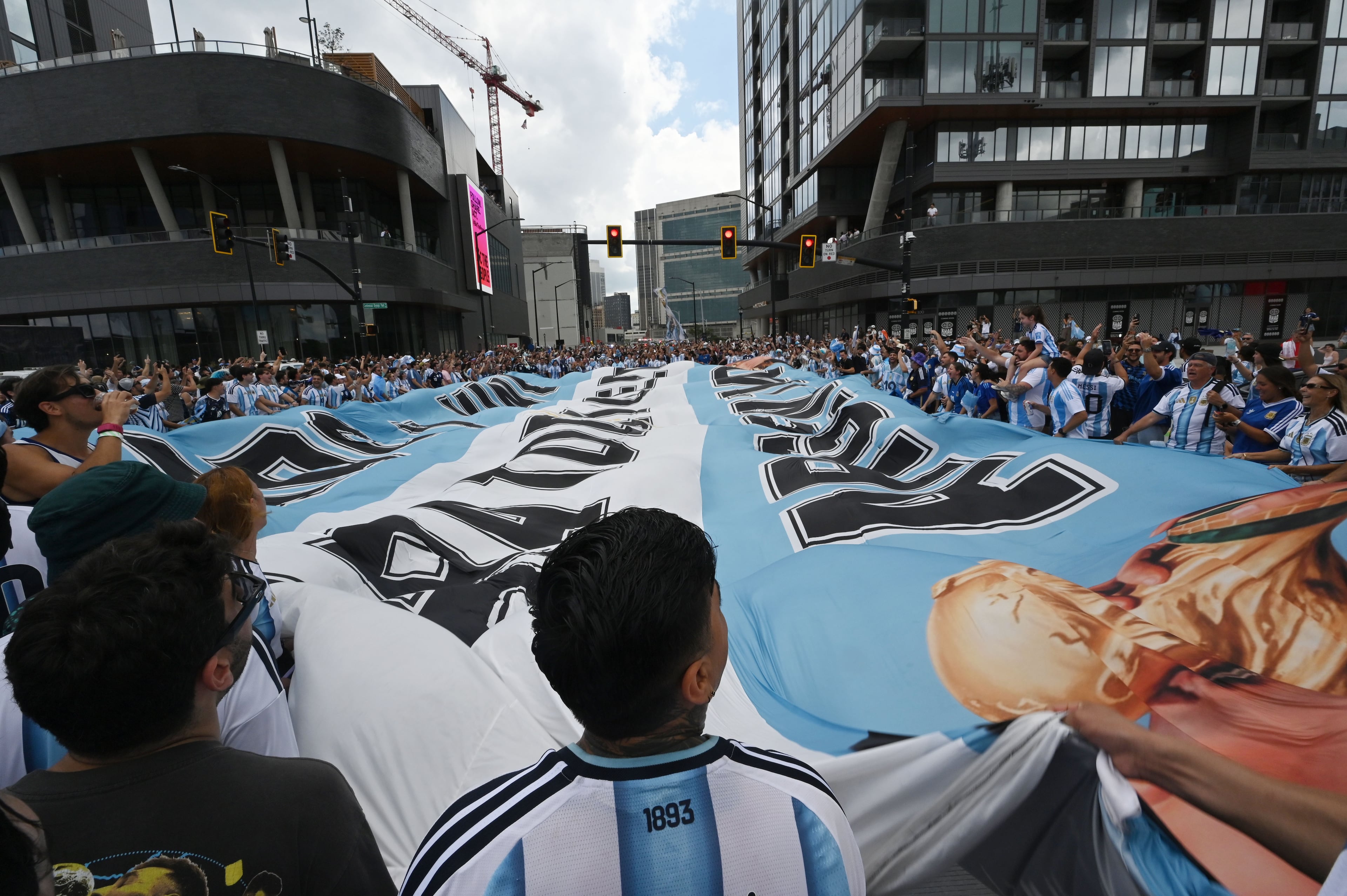 Argentina fans march and chant towards Atlanta Stadium (Mercedes Benz Stadium) before the FIFA World Cup semifinal between Argentina and England on Wednesday, July 15, 2026, in Atlanta. (Hyosub Shin/AJC)