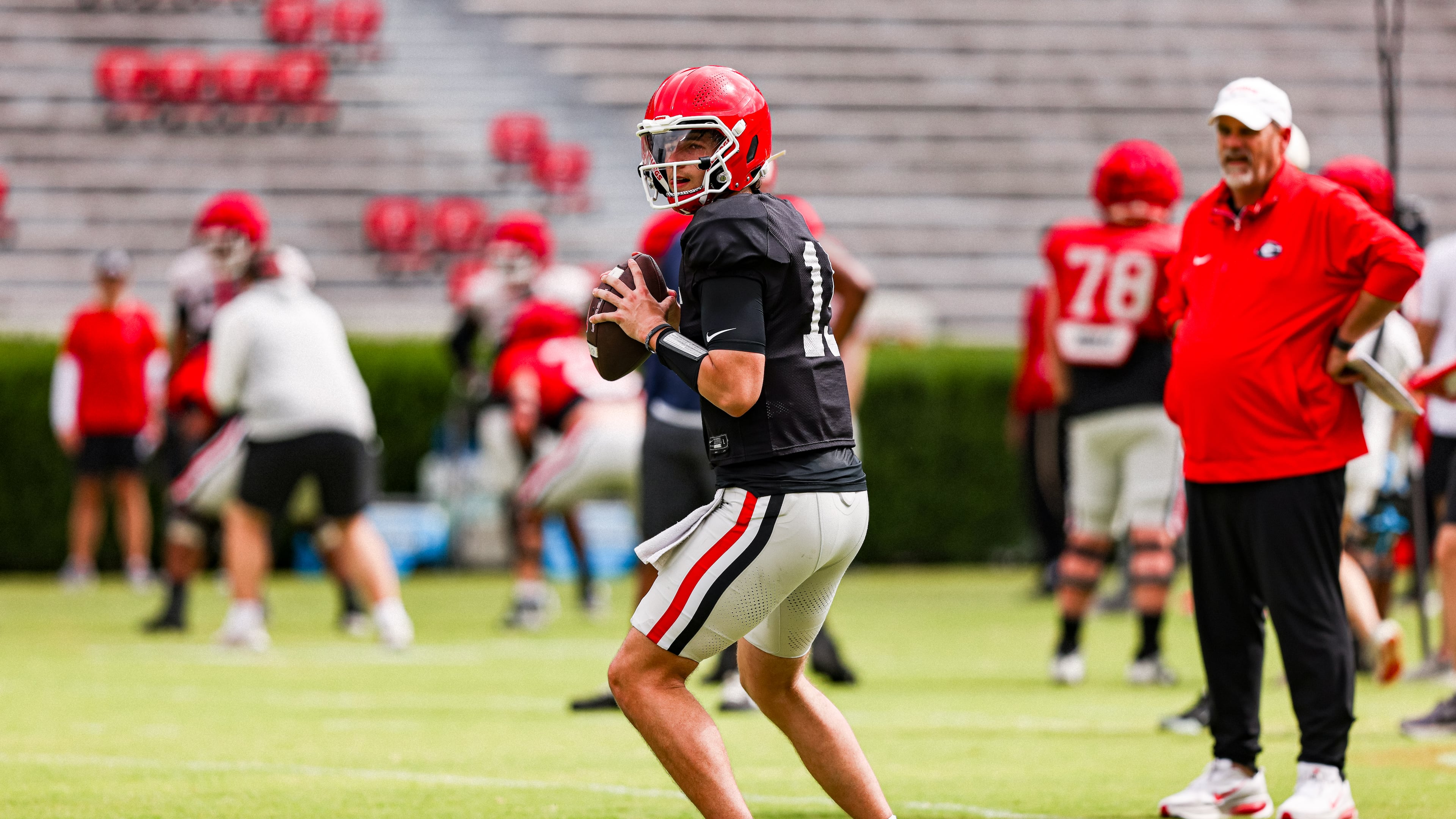Georgia quarterback Ryan Montgomery — pictured practicing in Athens on Saturday, April 4, 2026 — missed last spring and most of the Bulldogs' 2025 season recovering from knee surgery suffered in high school. (Tony Walsh/UGAAA)