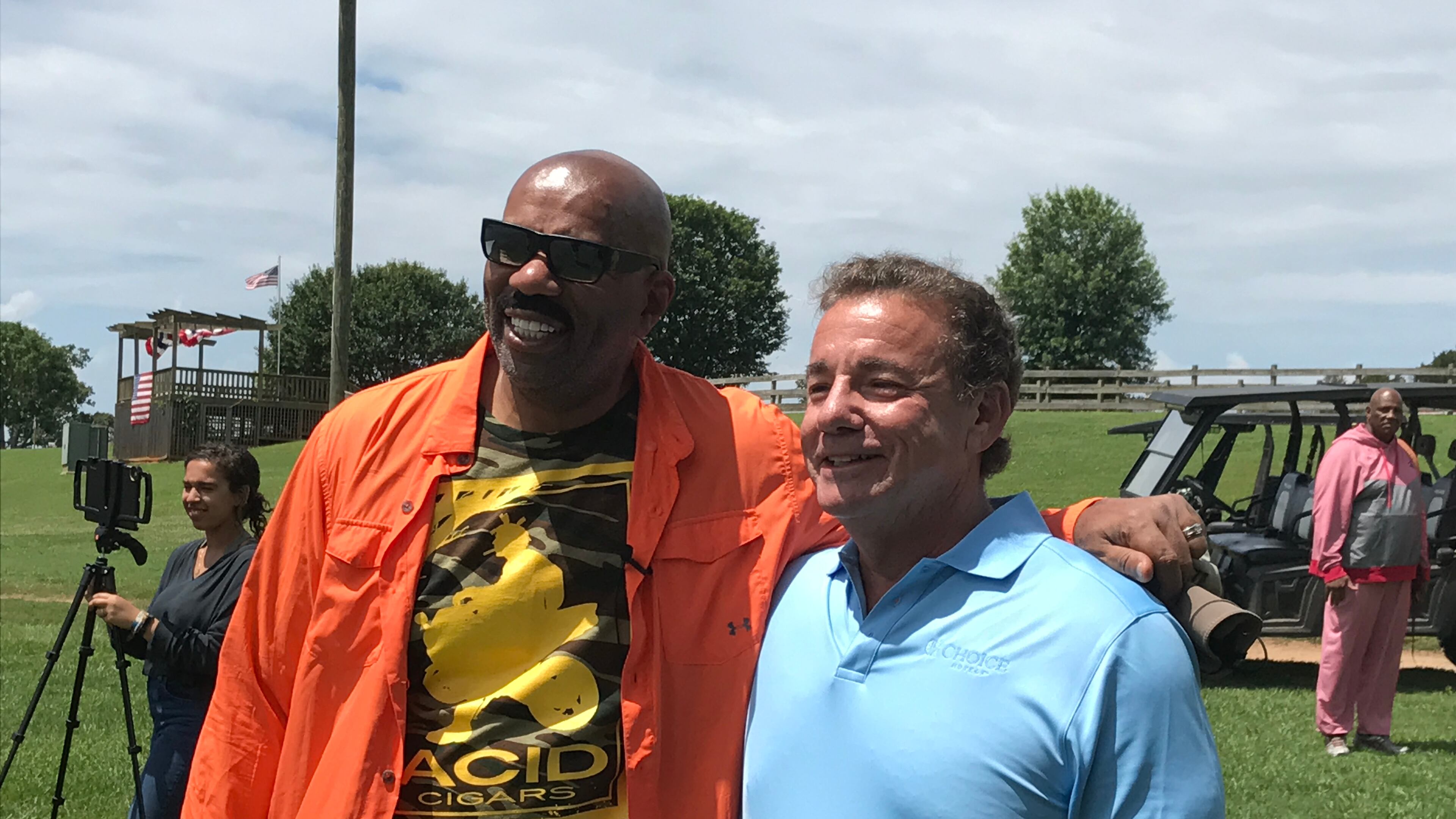 Steve Harvey poses with Choice Hotels CEO Stephen Joyce, who provided more than $500,000 in cash and in-kind donations to Harvey's camp this year. CREDIT: Rodney Ho/rho@ajc.com