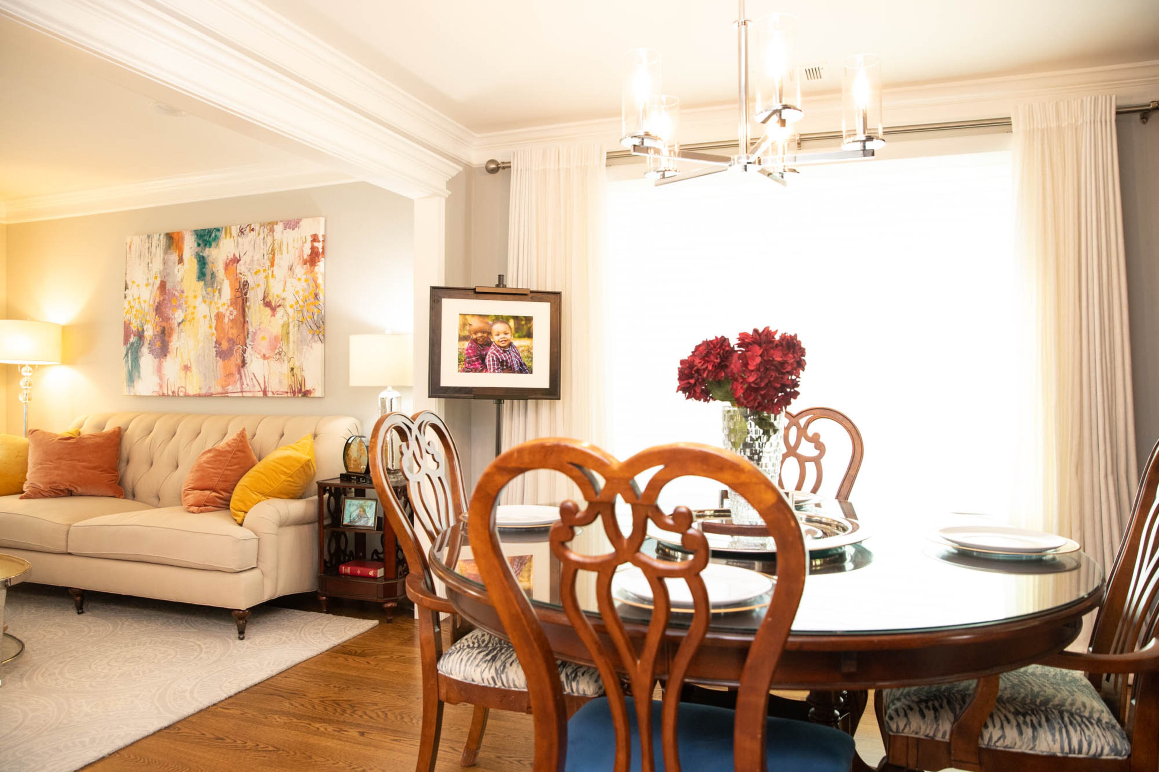 The dining room of Kenneth and Liza Hare’s home is chic and warm, with a table and chairs from Brownlee’s Furniture. Liza Hare had the chairs reupholstered, two to match the armchairs in the living room and two to bring a touch of blue into the dining space. The chandelier hanging above was inspired by a designer light fixture, and the couple found this piece at Lowe’s Home Improvement. Text by Shannon Dominy/Photo by Reynolds Rogers