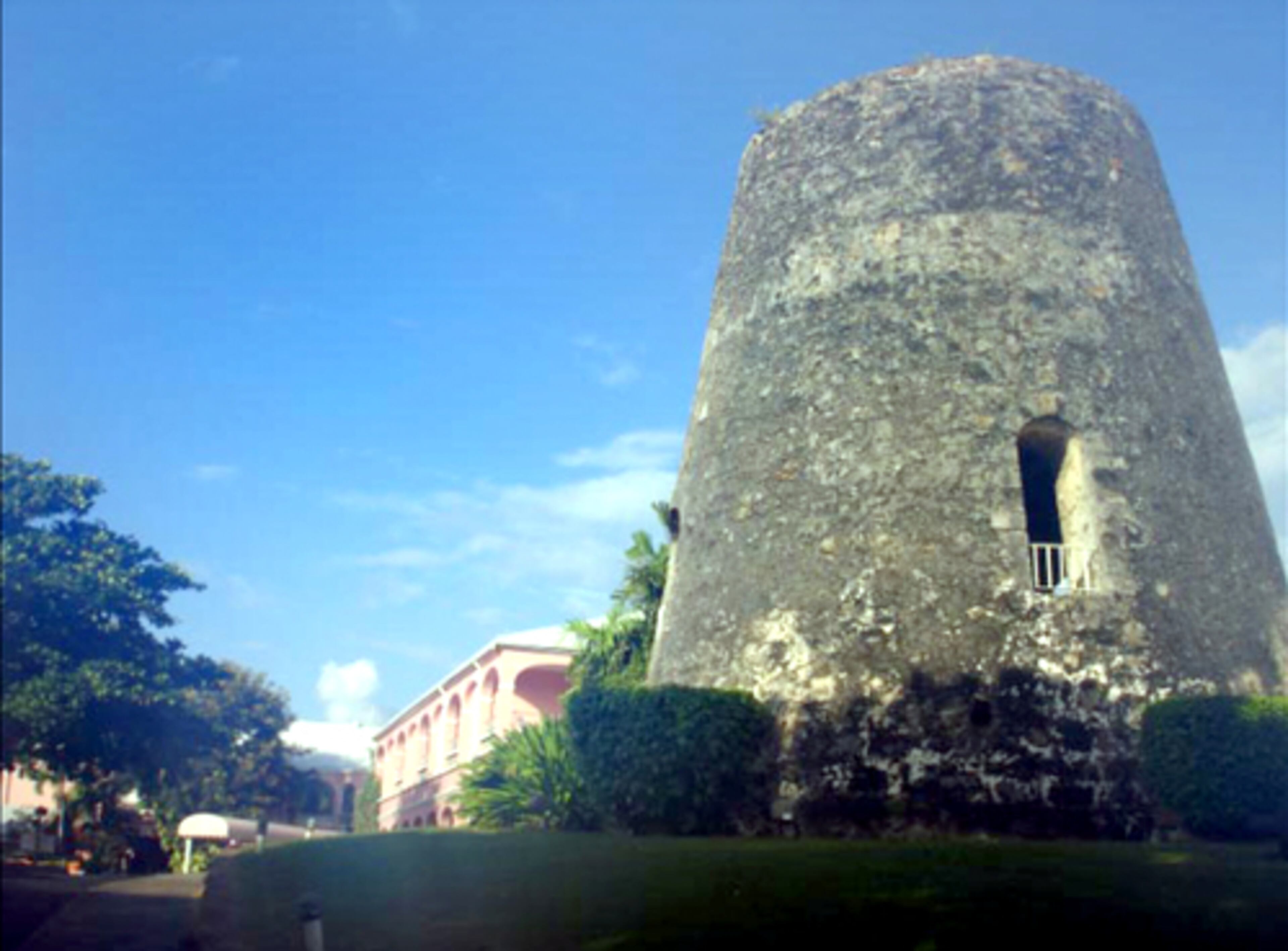 The sugar mill that stands next to the pink Main House at the Buccaneer Resort is one of many that dot the rolling green hillsides of St. Croix. The 300-year-old manor house constructed by Charles Martel, Knight of Malta, in 1653 was restored and became the original part of the Buccaneer, which was opened in 1948 by the Armstrong family who still run the resort.
