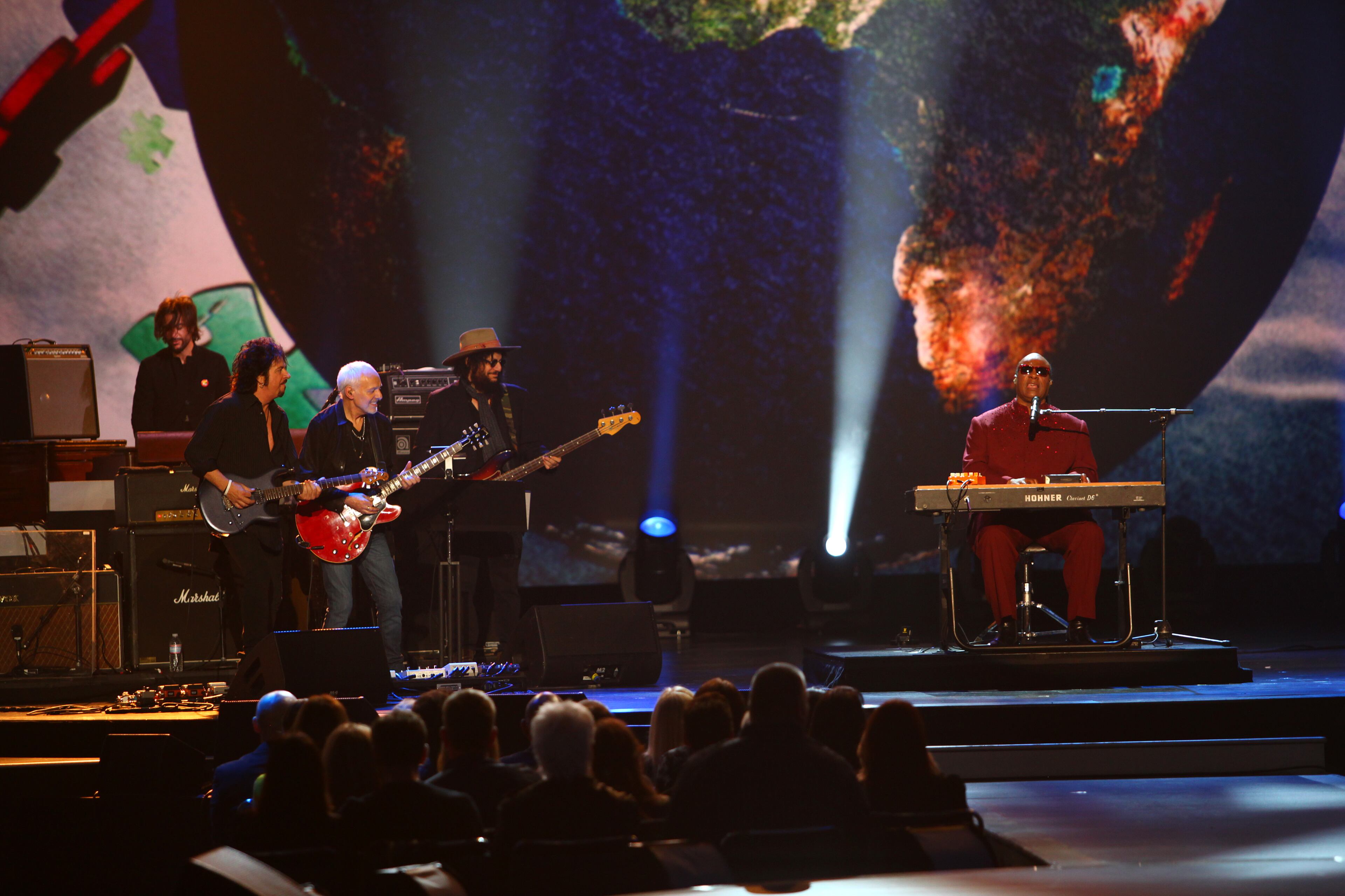 Stevie Wonder performs at The Night that Changed America: A Grammy Salute to the Beatles, on Monday, Jan. 27, 2014, in Los Angeles. (Photo by Zach Cordner/Invision/AP)