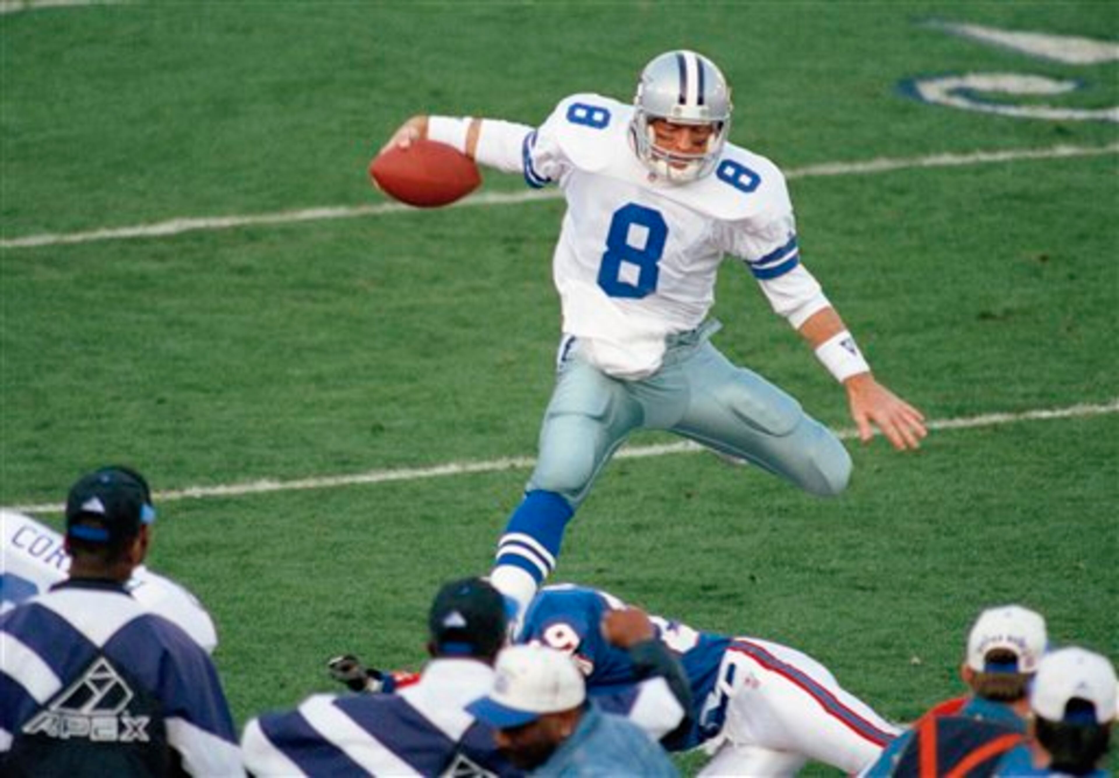 Dallas Cowboys quarterback Troy Aikman goes airborne for a second-quarter gain on Sunday, January 31, 1993 in Super Bowl action in Pasadena, California. The Cowboys won 52-17 against the Buffalo Bills.(AP Photo/ Reed Saxon)