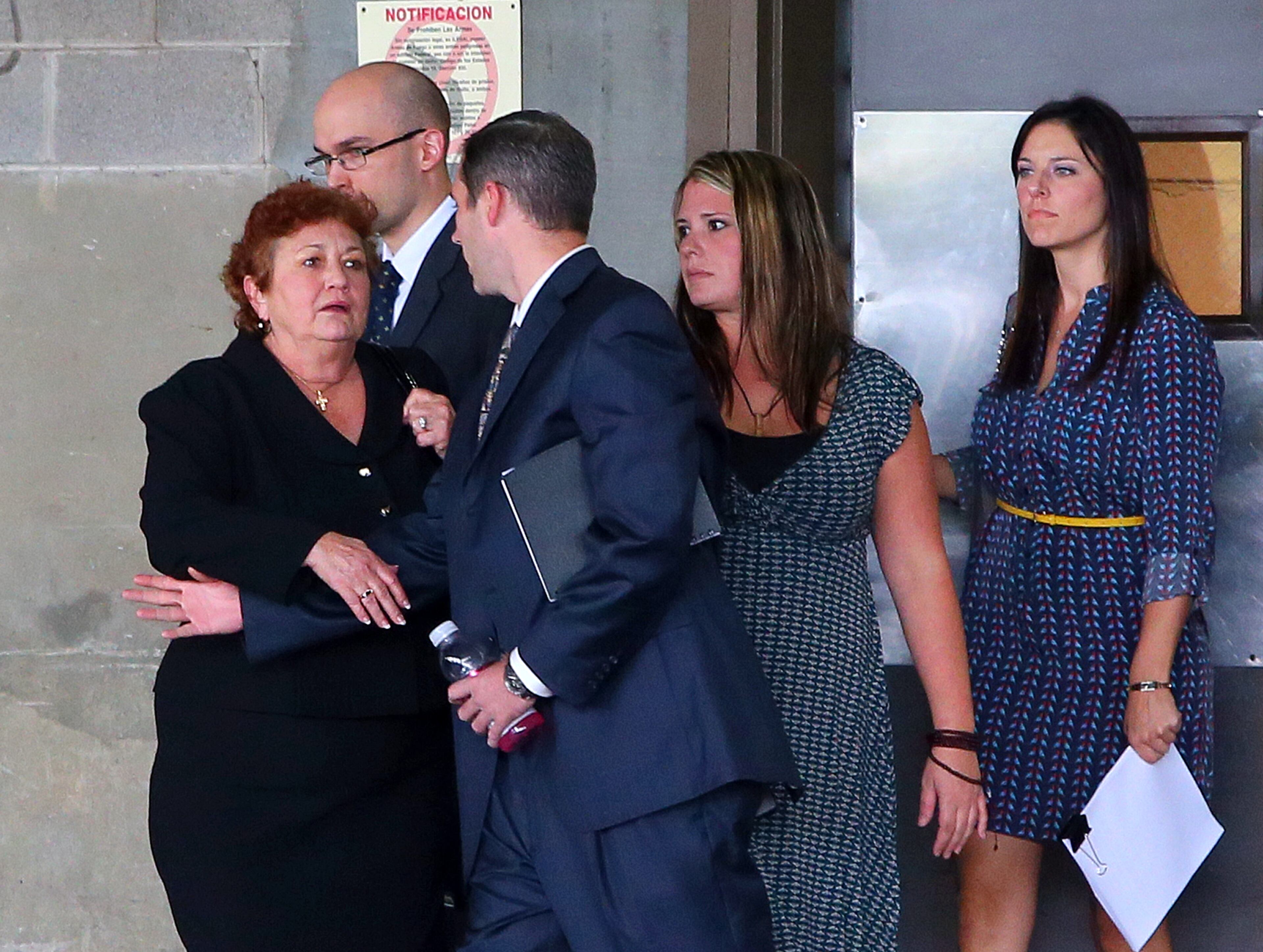 Shirley Lasseter's sentence was shortened from a minimum of 46 months to 33 months after she cooperated with authorities by secretly recording conversations and providing information that led directly to charges brought in September 2012 against Lawrenceville businessman Mark Gary. She is currently serving her time in prison.