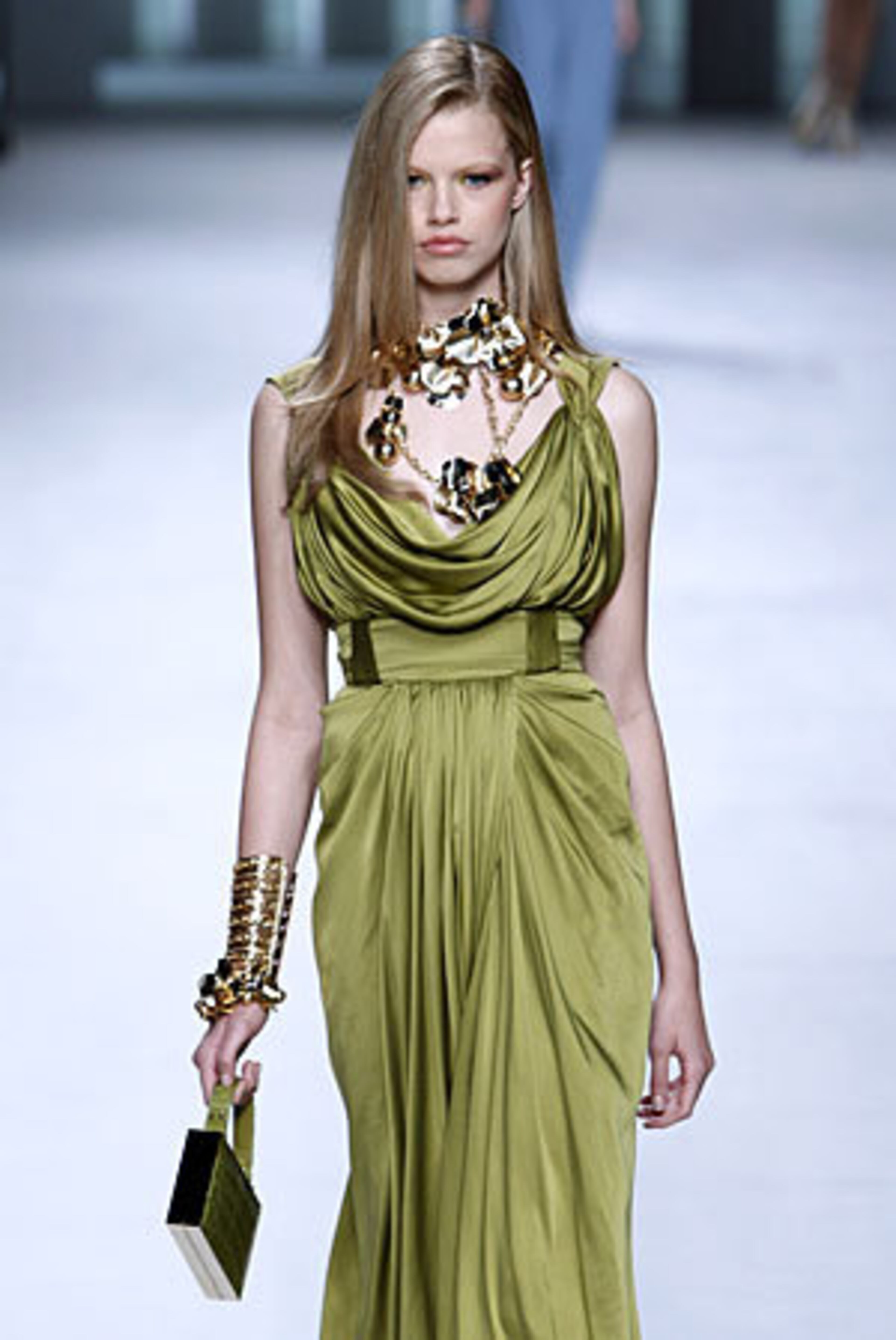 A model displays a creation by Lebanese fashion designer Elie Saab at his spring-summer 2011 ready to wear collection, presented in Paris, Wednesday, Oct. 6, 2010.