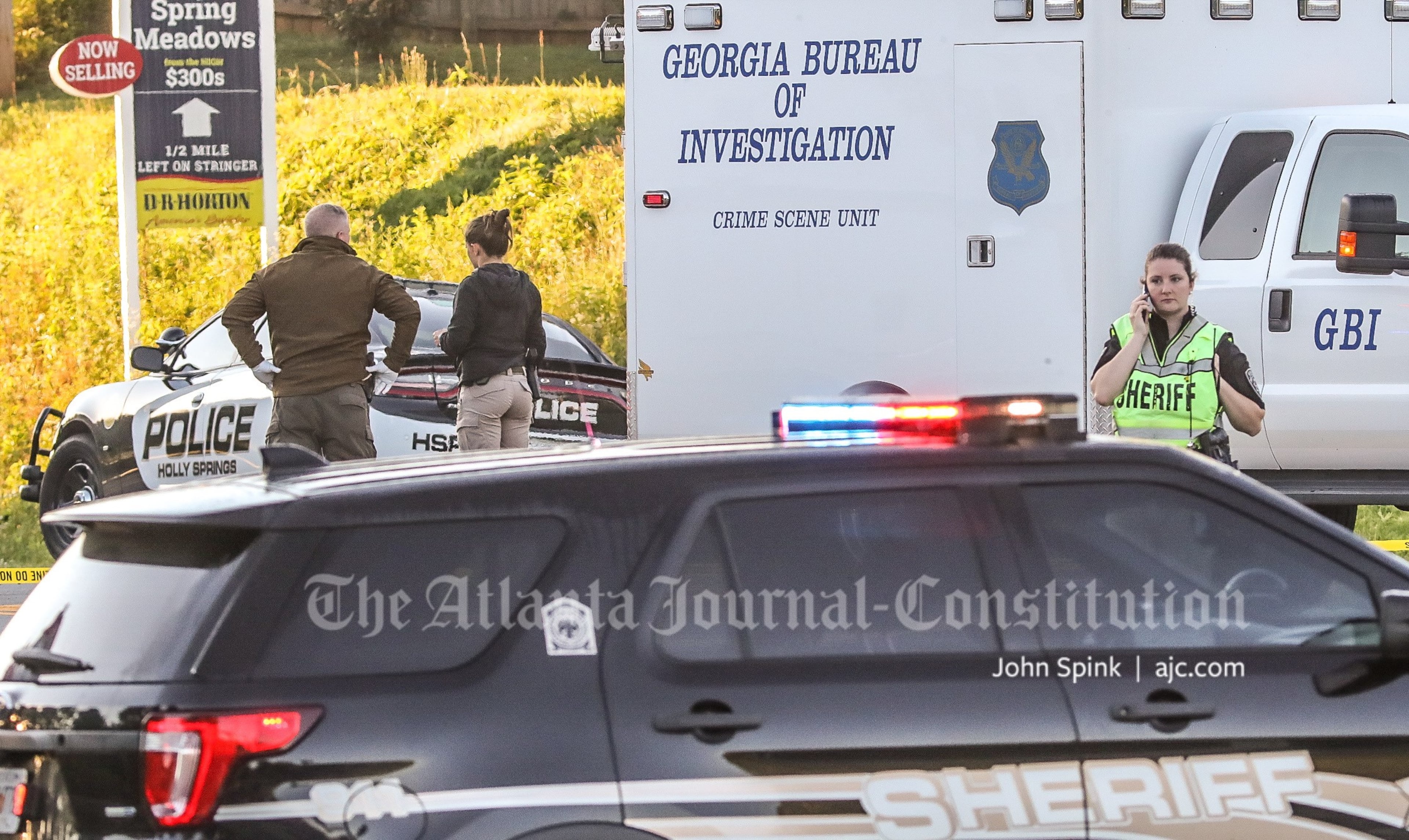 Holly Springs police, Cherokee County sheriff's deputies and GBI agents were at the scene Thursday morning.