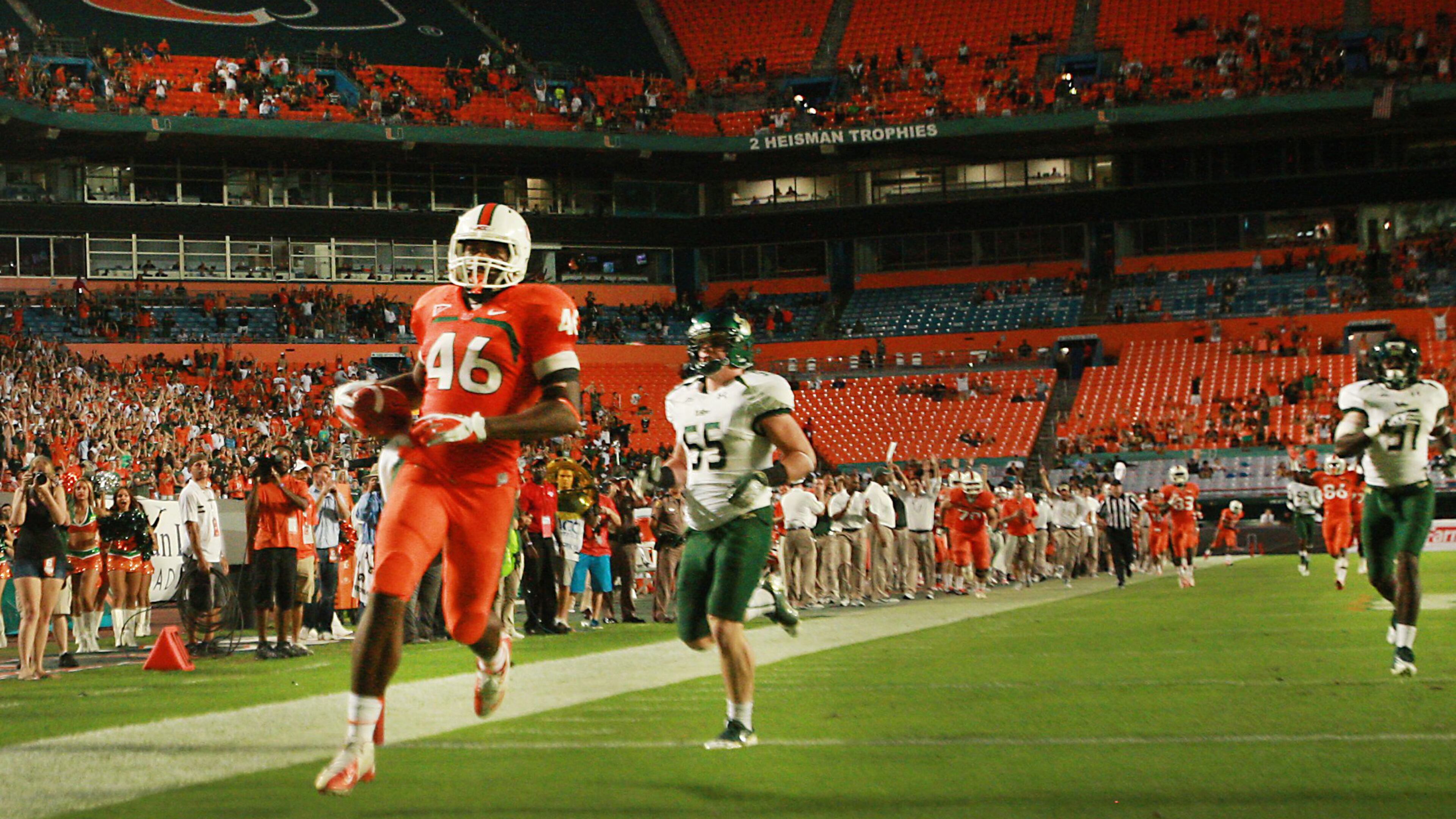Miami's Clive Walford runs in for a touchdown atfer a pass reception in the fourth quarter against South Florida at Sun Life Stadium in Miami Gardens, Florida, on Saturday, November 17, 2012. Miami rolled, 40-9. (C.W. Griffin/Miami Herald/MCT)