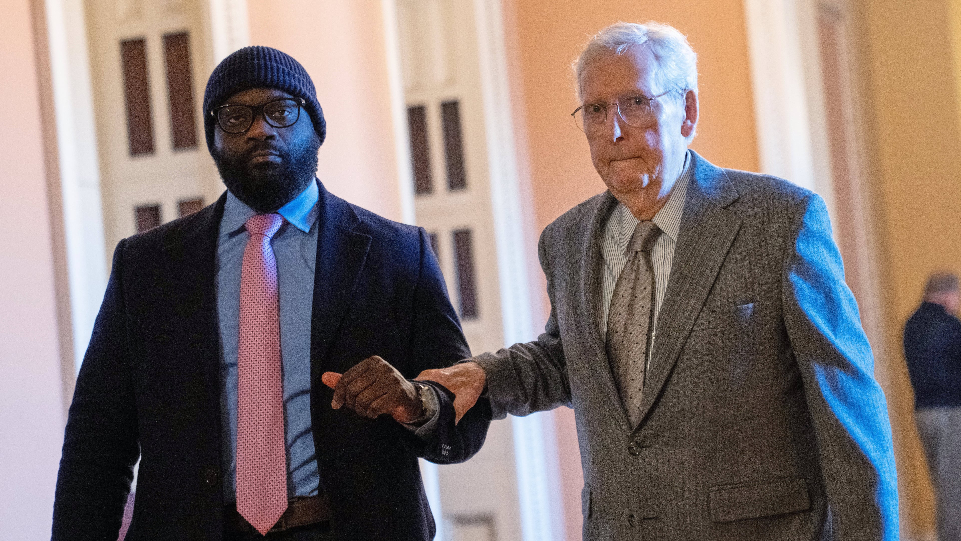 FILE - Sen. Mitch McConnell, R-Ky., right, walks through the Capitol, Jan. 15, 2026, in Washington. (AP Photo/Allison Robbert, File)