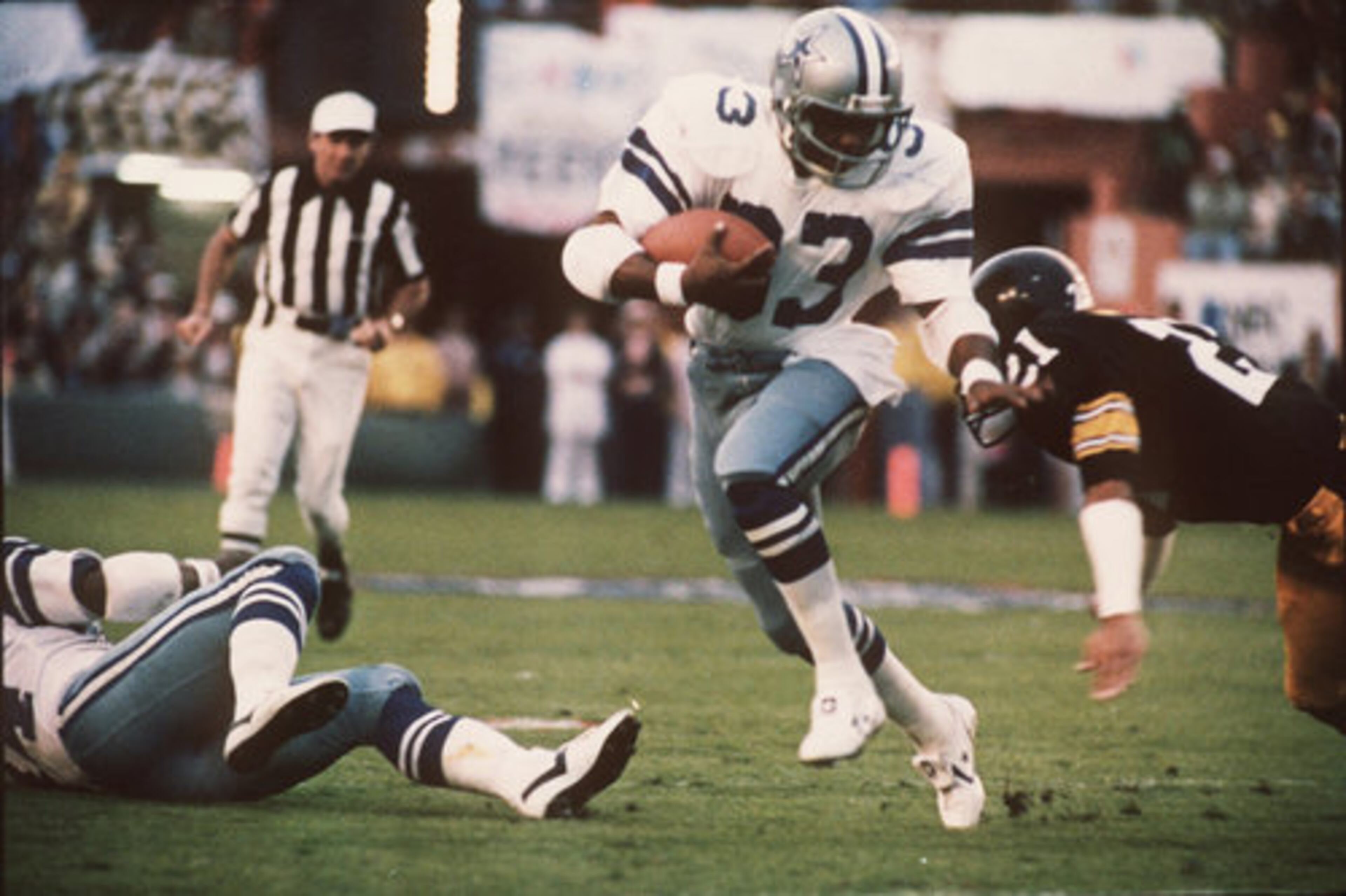 6. Tony Dorsett, 1976 Heisman (Pittsburgh) - As a member of the Dallas Cowboys and Denver Broncos, Dorsett ran for 12,739 yards on 2,936 attempts (4.3 yard average) and 92 total touchdowns over 12 seasons. He is one of only two Hall of Famers to have won a Heisman Trophy, a Super Bowl and a college football championship.