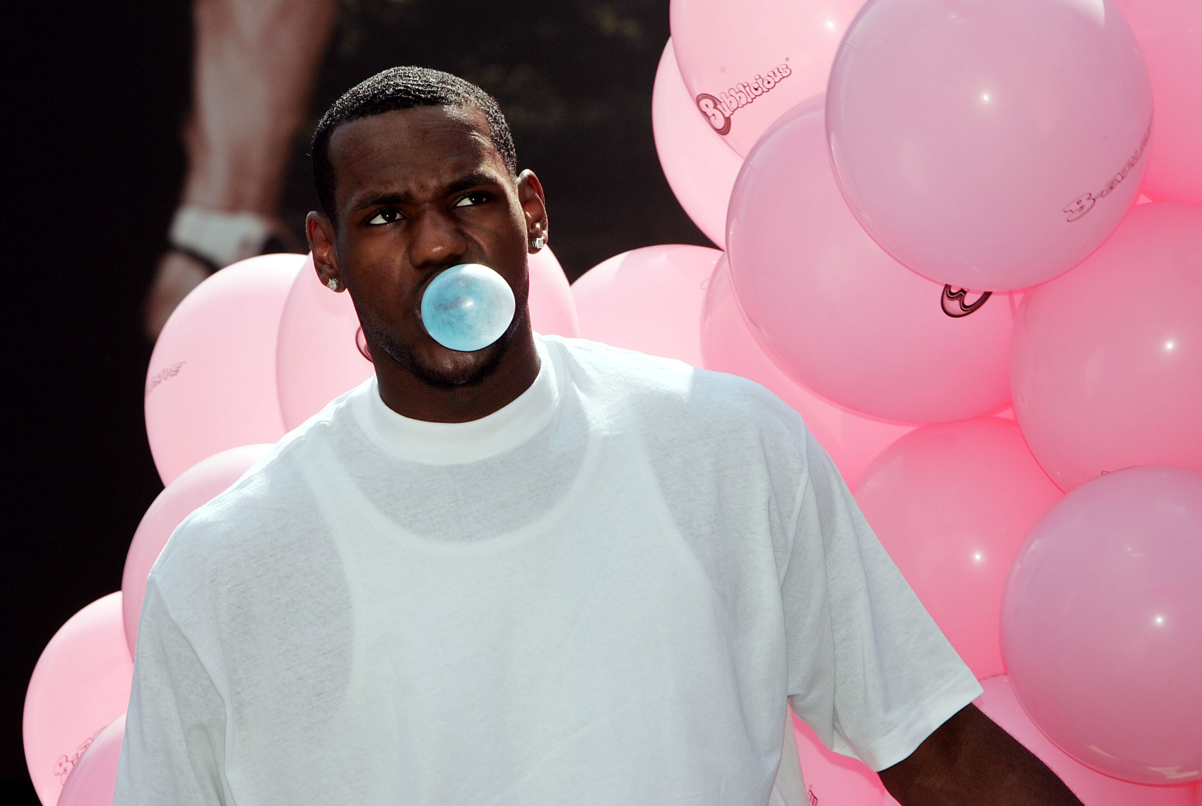 NEW YORK - JULY 8: Cleveland Cavalier star LeBron James poses for photos during a Bubblicious bubble- blowing contest in Times Square July 8, 2004 in New York City. (Photo by Scott Gries/Getty Images)