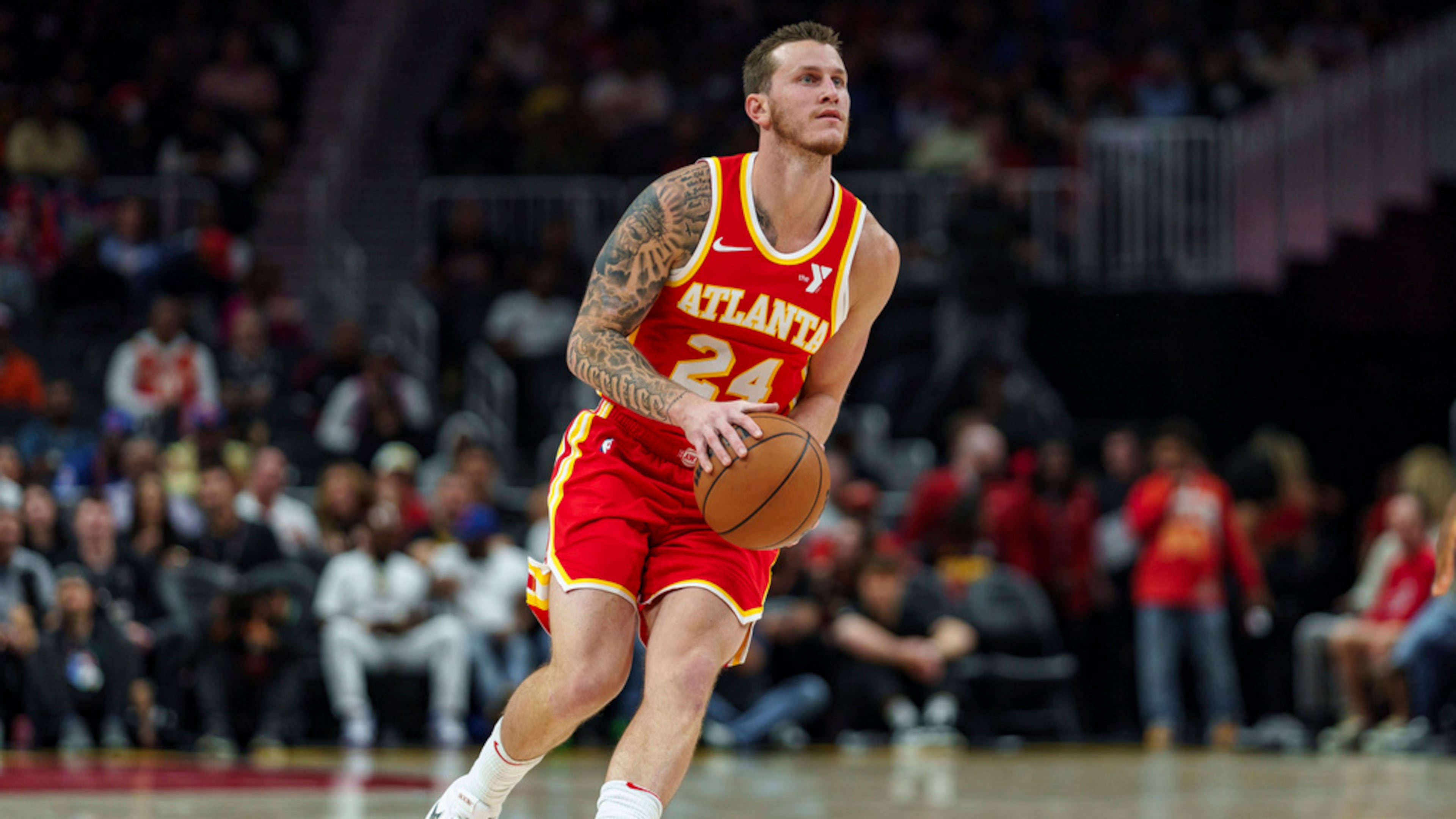 Atlanta Hawks guard Garrison Mathews (24) lines up for a three-point shot during the first half of an NBA basketball game against the New York Knicks, Wednesday, Nov. 6, 2024, in Atlanta. (AP Photo/Jason Allen)
