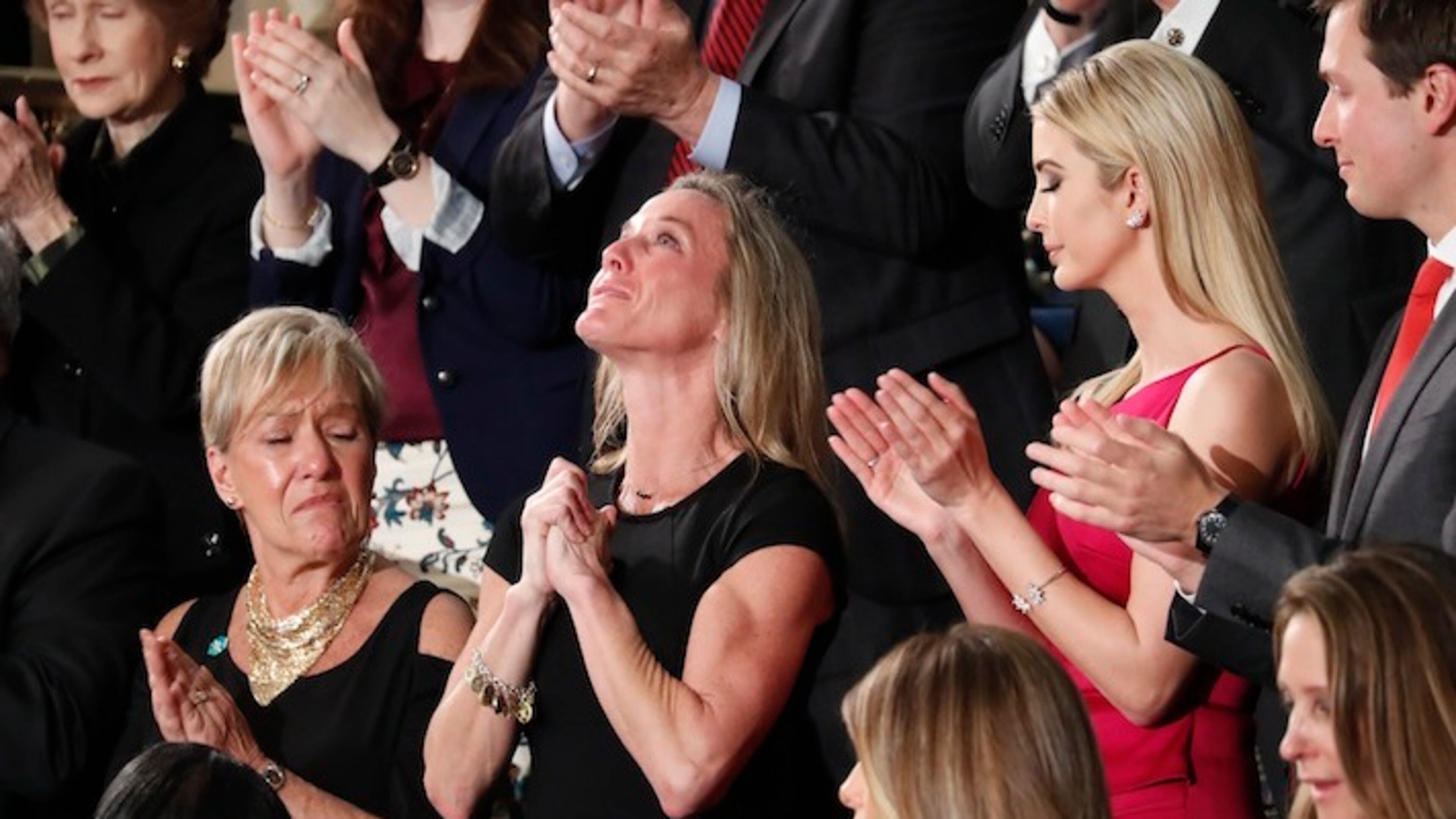 Carryn Owens, widow of widow of Chief Special Warfare Operator William "Ryan" Owens, is applauded on Capitol Hill in Washington, Tuesday, Feb. 28, 2017, as she was acknowledged by President Donald Trump during his address to a joint session of Congress. (AP Photo/Pablo Martinez Monsivais)
