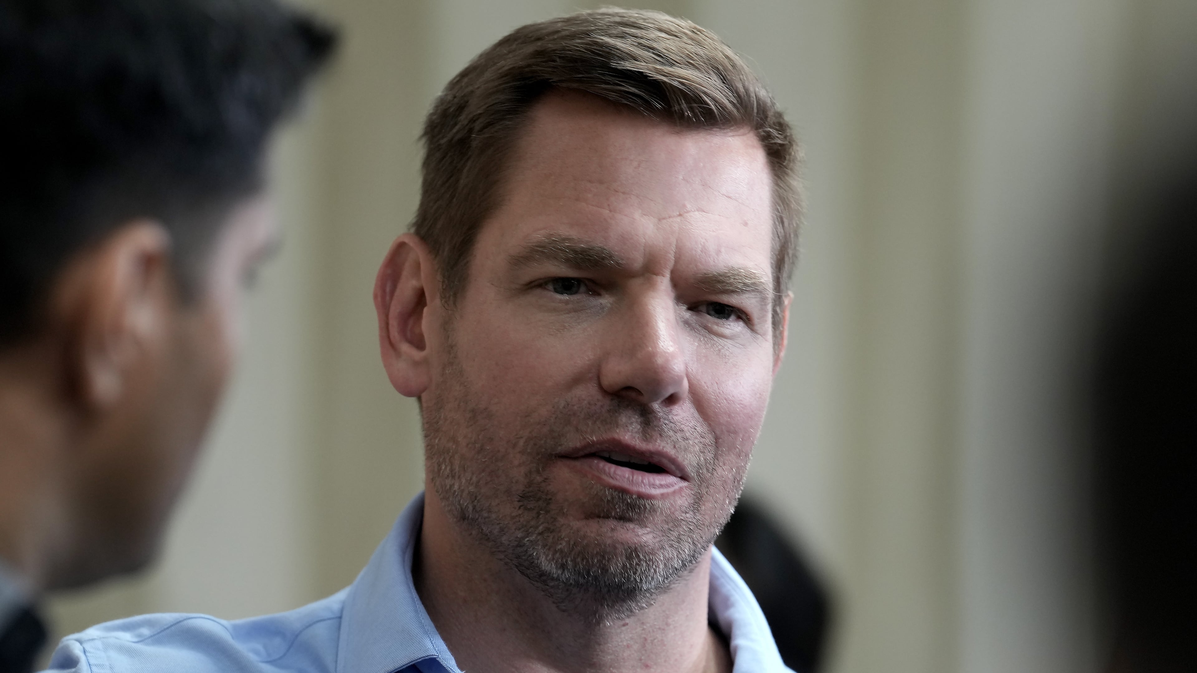 California gubernatorial candidate Rep. Eric Swalwell, D-Calif., talks with reporters after holding a town hall meeting in Sacramento, Calif., Tuesday, April 7, 2026. (AP Photo/Rich Pedroncelli)