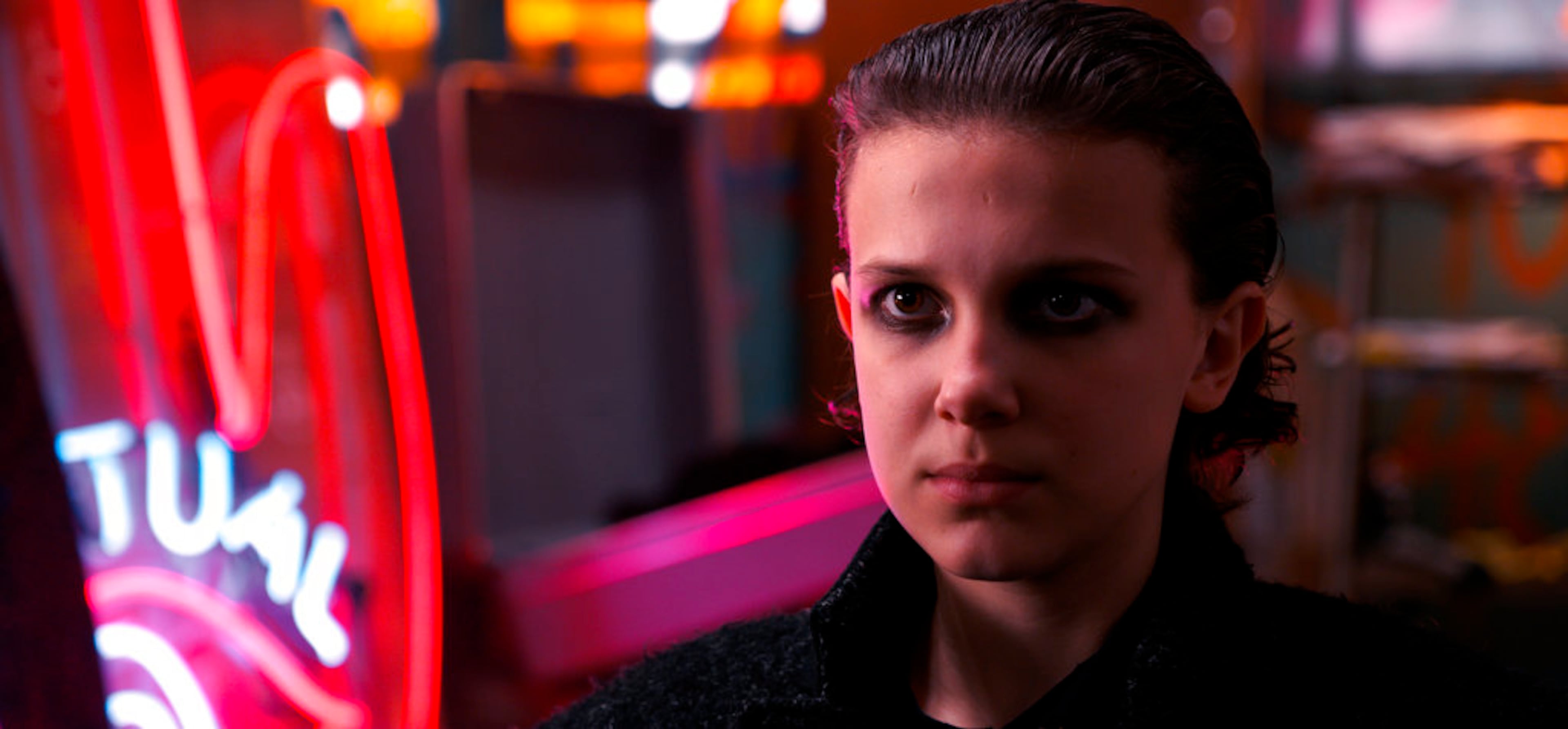 This image released by Netflix shows Millie Bobby Brown in a scene from "Stranger Things 2." Brown was nominated Thursday for an Emmy for outstanding supporting actress in a drama series. The 70th Emmy Awards will be held on Monday, Sept. 17. (Netflix via AP)