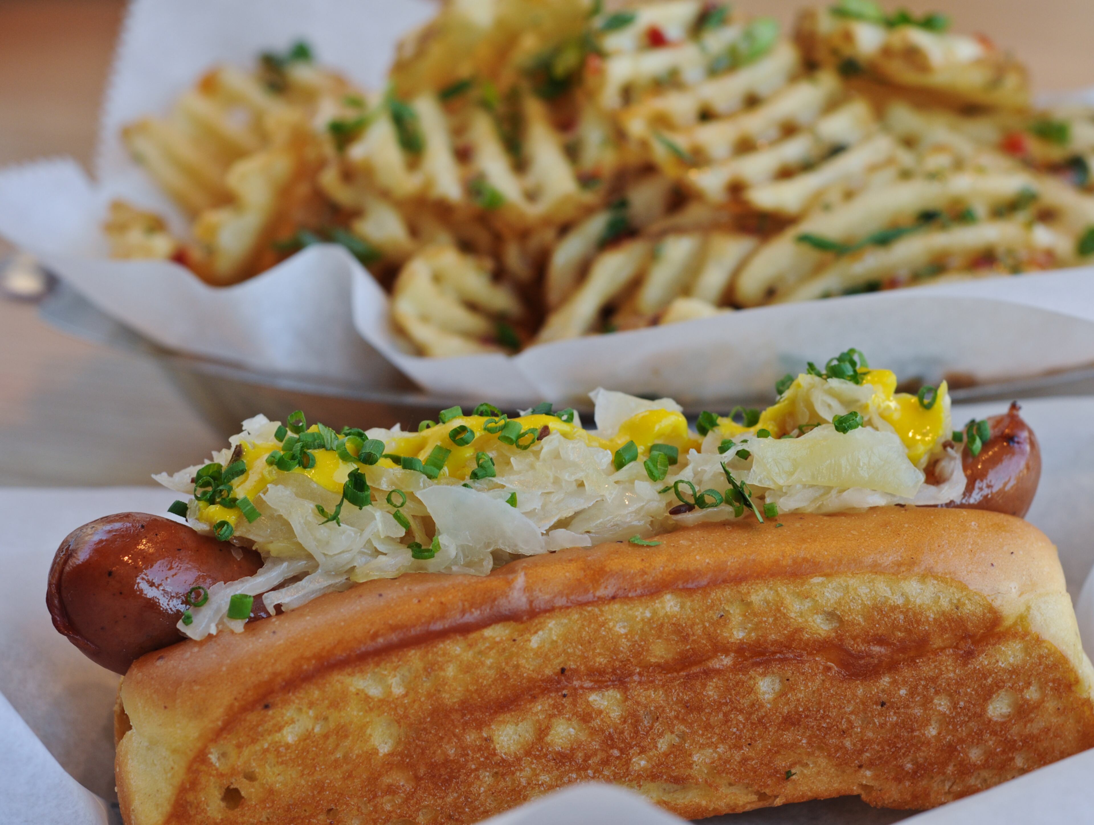 "And so HD1 remains a restaurant that puts care and creativity into its cooking, and yet never manages to hit the hot dog button quite right. The kitchen now uses dense, smoky Patak franks, which is an improvement, though the once-boisterous list of sides is gone. You can get waffle fries, half-sour pickles, baked beans and a couple of salads — none of it in funky-weird (chef Richard) Blais territory."