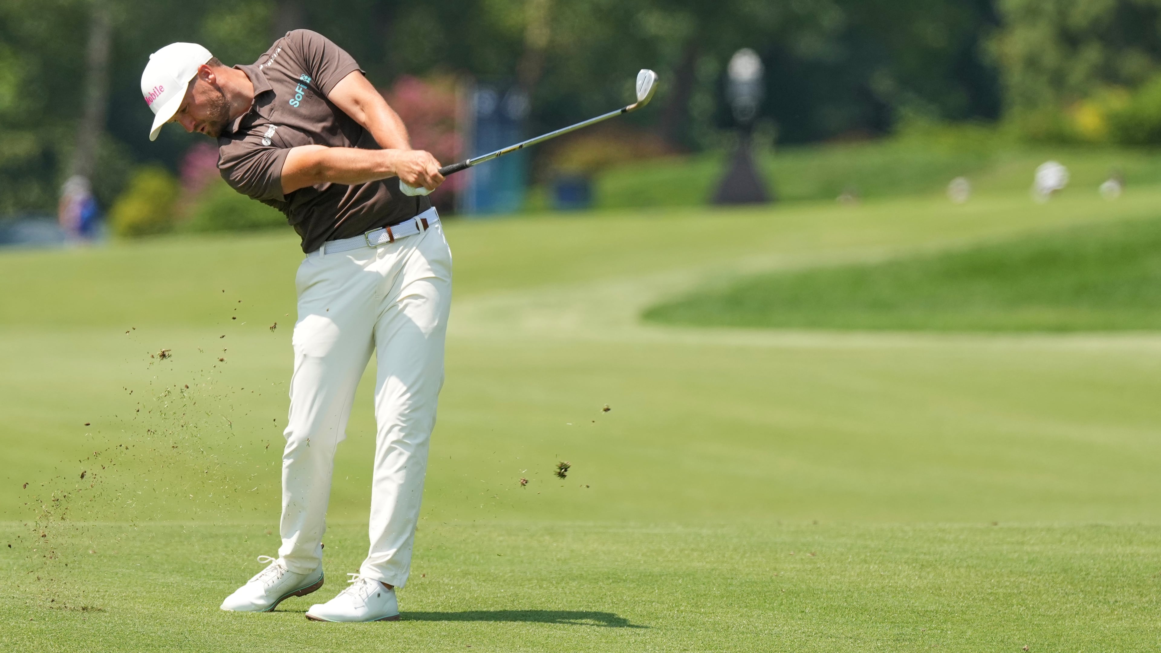 Wyndham Clark hits from the fourth fairway during the third round of the BMW Championship golf tournament Saturday, Aug. 22, 2026, in St. Louis. (AP Photo/Jeff Roberson)