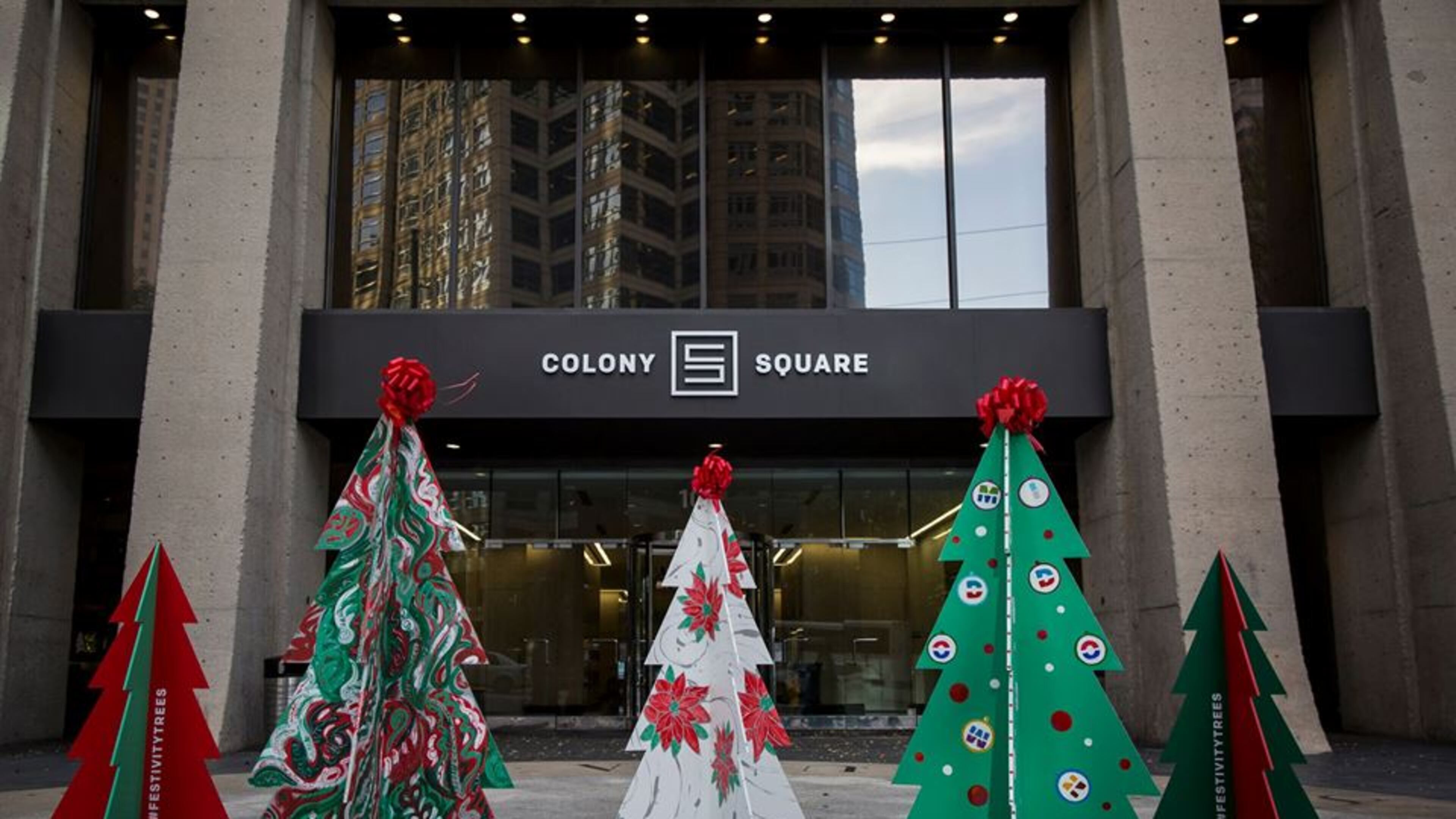 Image from the first annual Festivity + Trees at Colony Square in Midtown. This year, the event returns with 25 new trees designed by local artists.