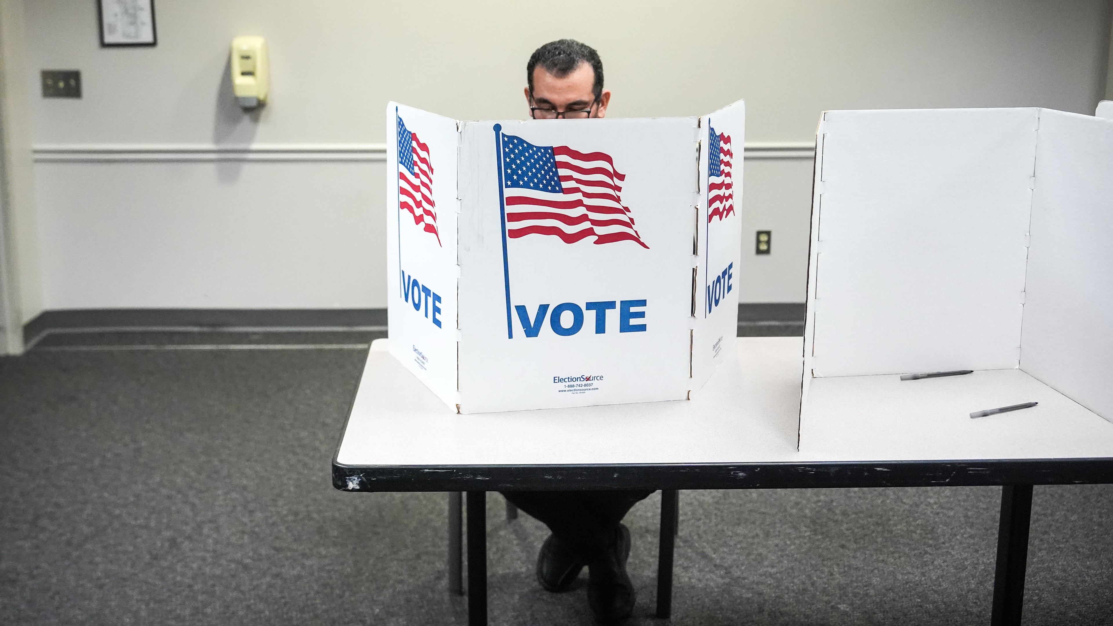 A person votes in the Virginia redistricting referendum at Fairfax Government Center, Tuesday, April 21, 2026, in Fairfax, Va. (AP Photo/Julia Demaree Nikhinson)