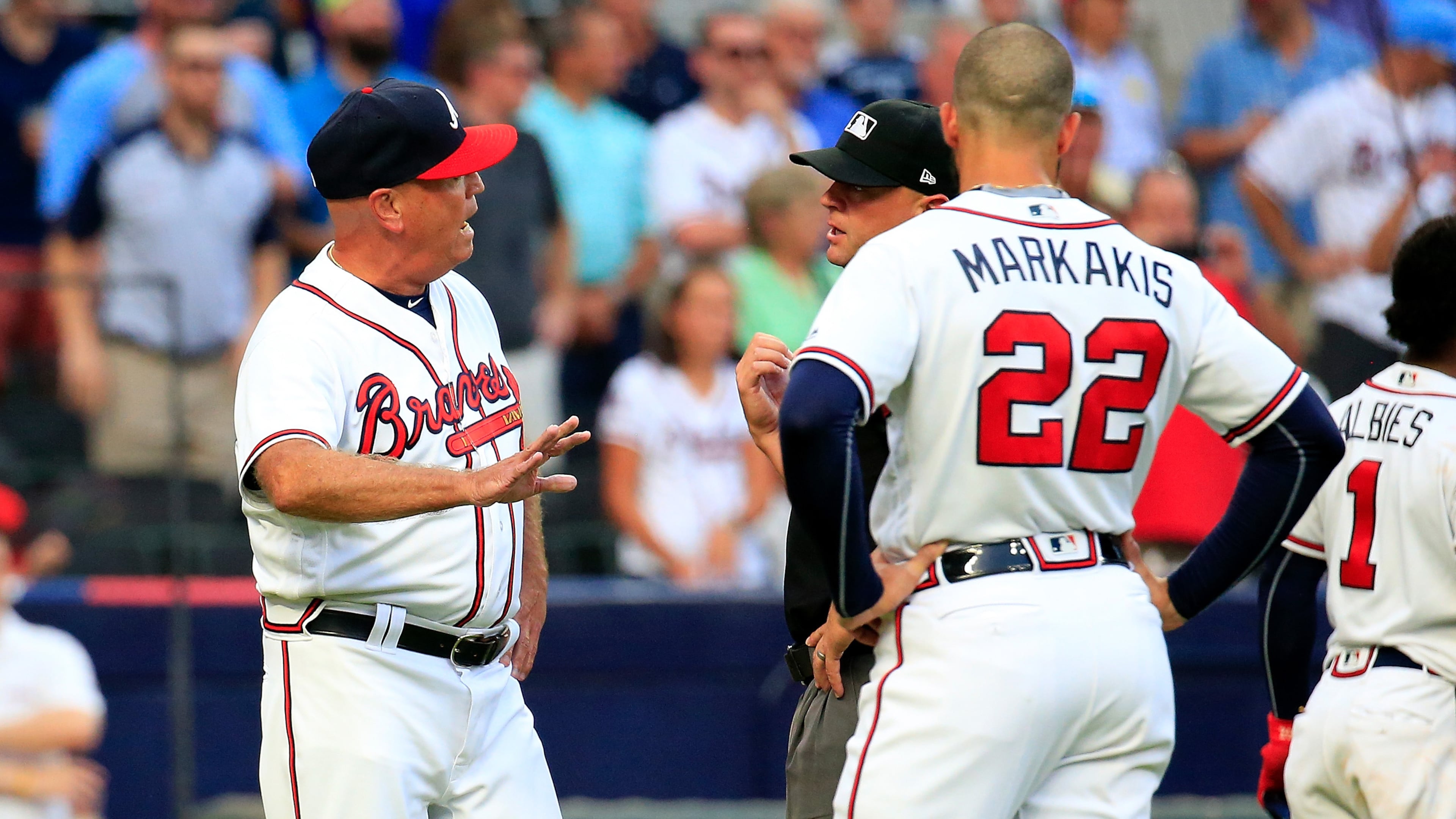 ATLANTA, GA - AUGUST 15: Manager Brian Snitker #43 of the Atlanta Braves argues with the umpires after Ronald Acuna Jr. was hit by a pitch during the first inning against the Miami Marlins at SunTrust Park on August 15, 2018 in Atlanta, Georgia. (Photo by Daniel Shirey/Getty Images)