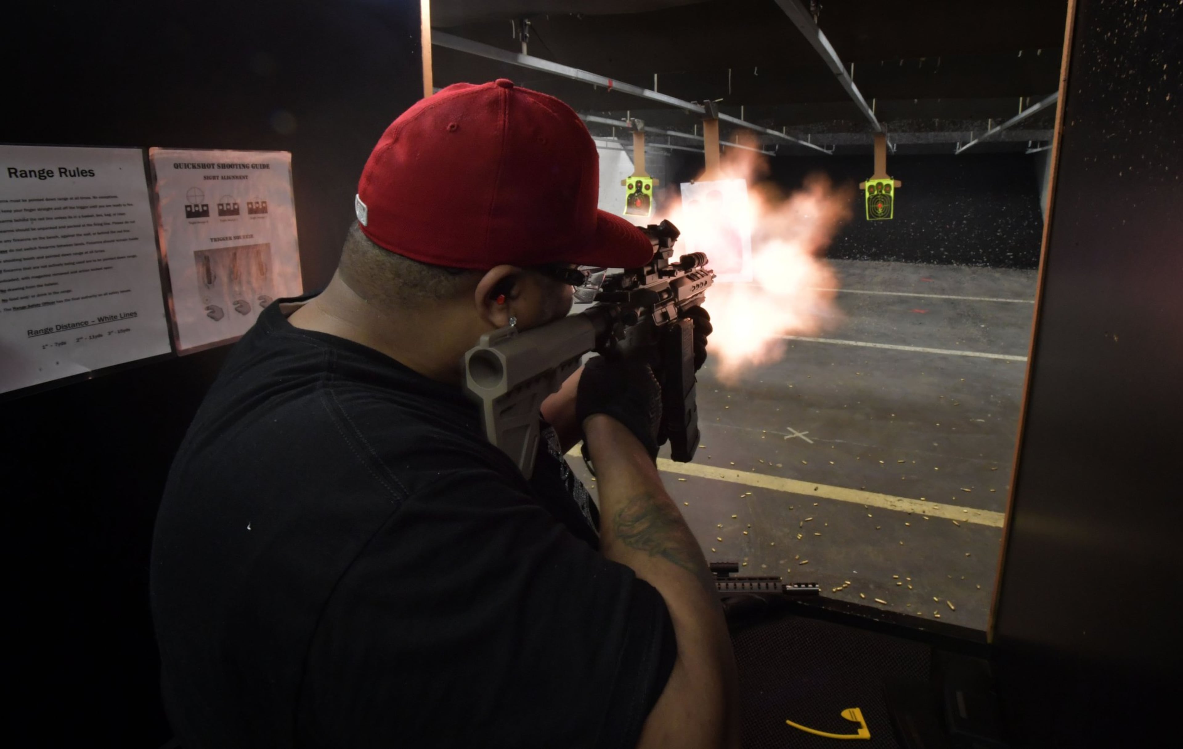 David Smith, member of Bass Reeves Gun & Rifle Club, fires his AR308 in the gun range during their meeting at Quickshot Shooting Range in Atlanta. Hyosub Shin / hshin@ajc.com