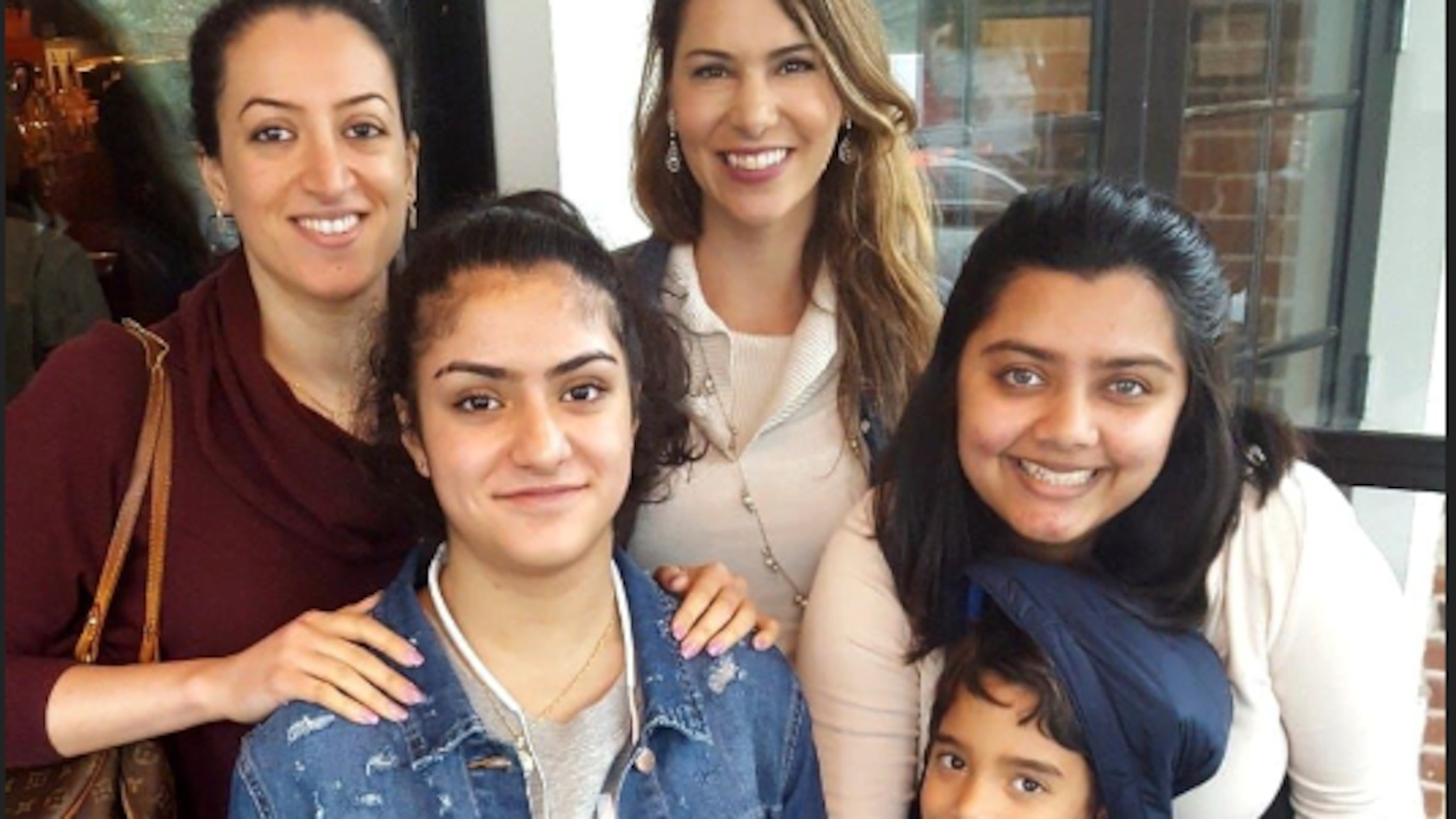 Ghadir Taher (far left) with friends and family in Georgia: Mary Trachian-Bradley (center) Ghadir’s sister Saley Talabani (bottom left) Birva Hansalia and Trachian-Bradley’s son, Gabriel.