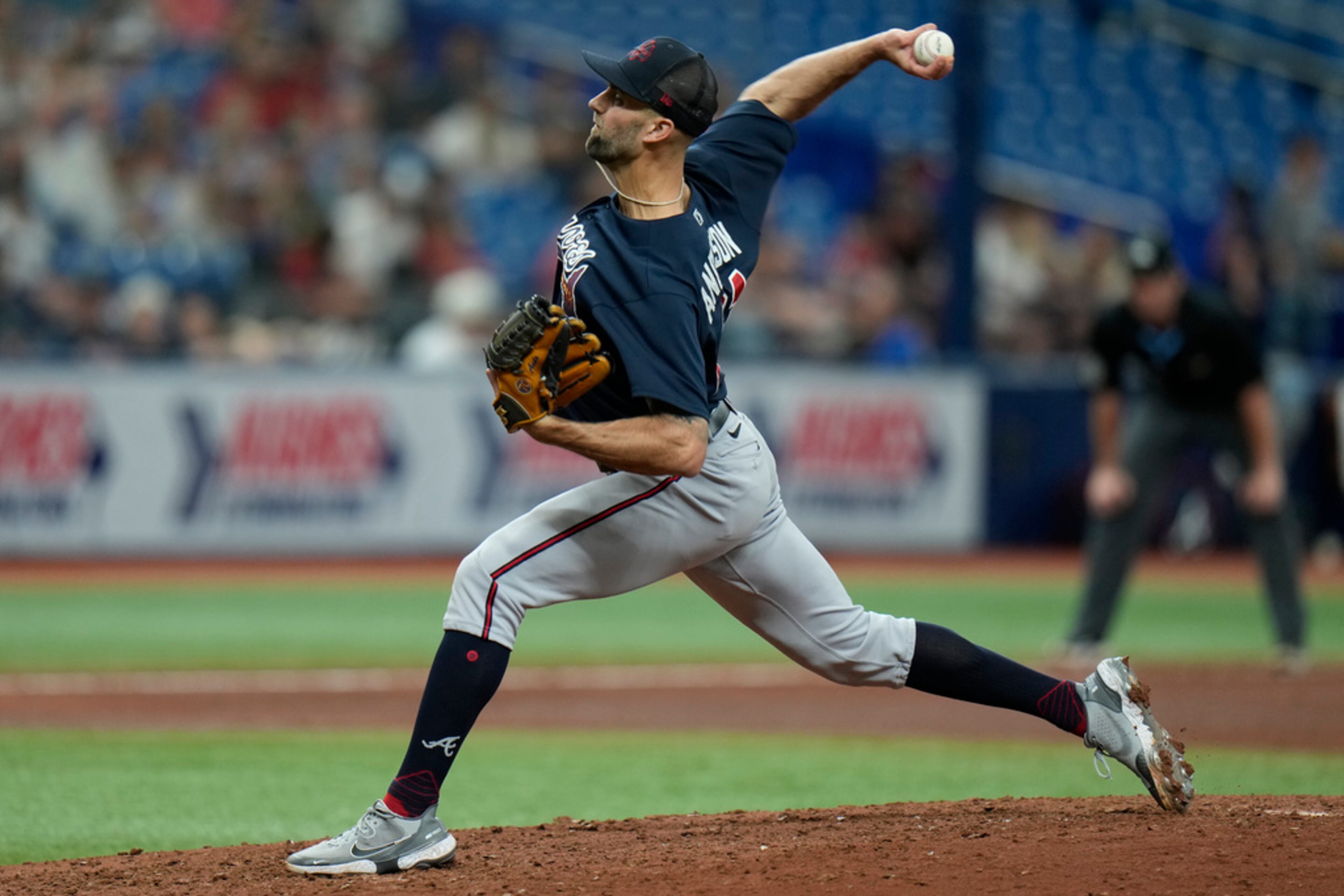 Atlanta Braves relief pitcher Nick Anderson delivers to the Tampa Bay Rays during the sixth inning of a spring training baseball game Friday, March 10, 2023, in St. Petersburg, Fla. (AP Photo/Chris O'Meara)