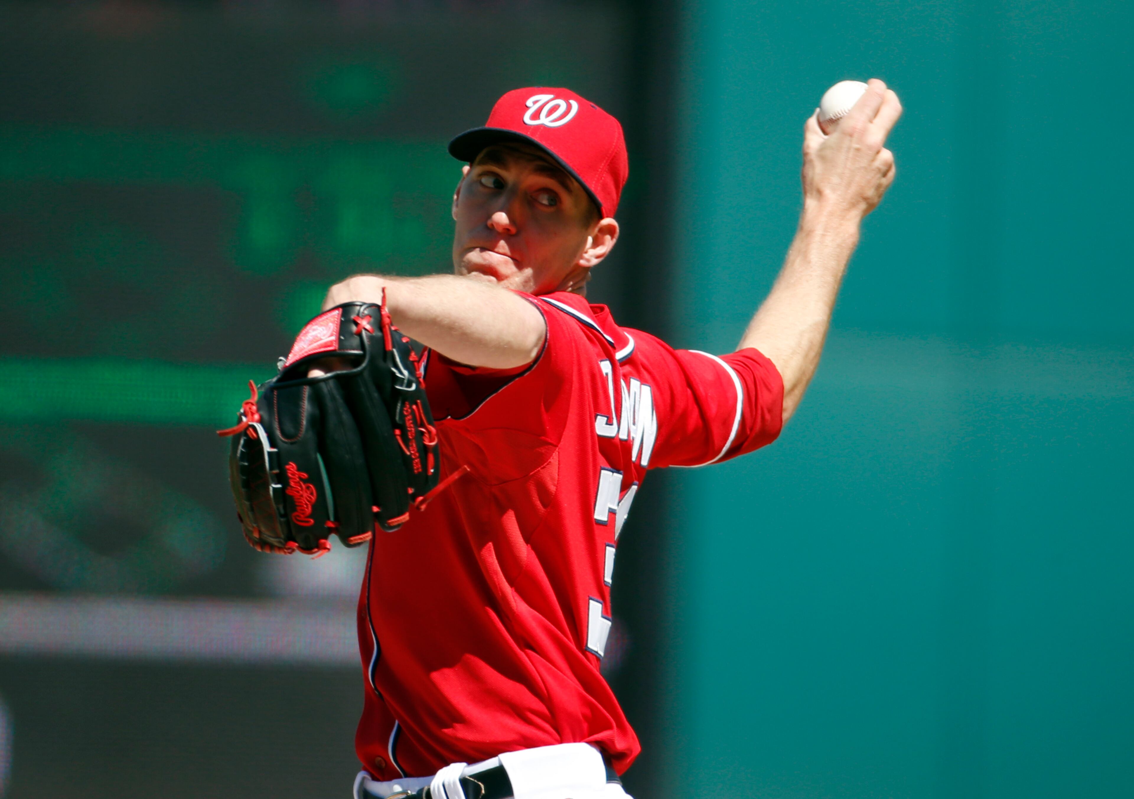 Washington Nationals starting pitcher Taylor Jordan throws during the third inning of a baseball game against the Atlanta Braves at Nationals Park, Sunday, April 6, 2014, in Washington. (AP Photo/Alex Brandon)