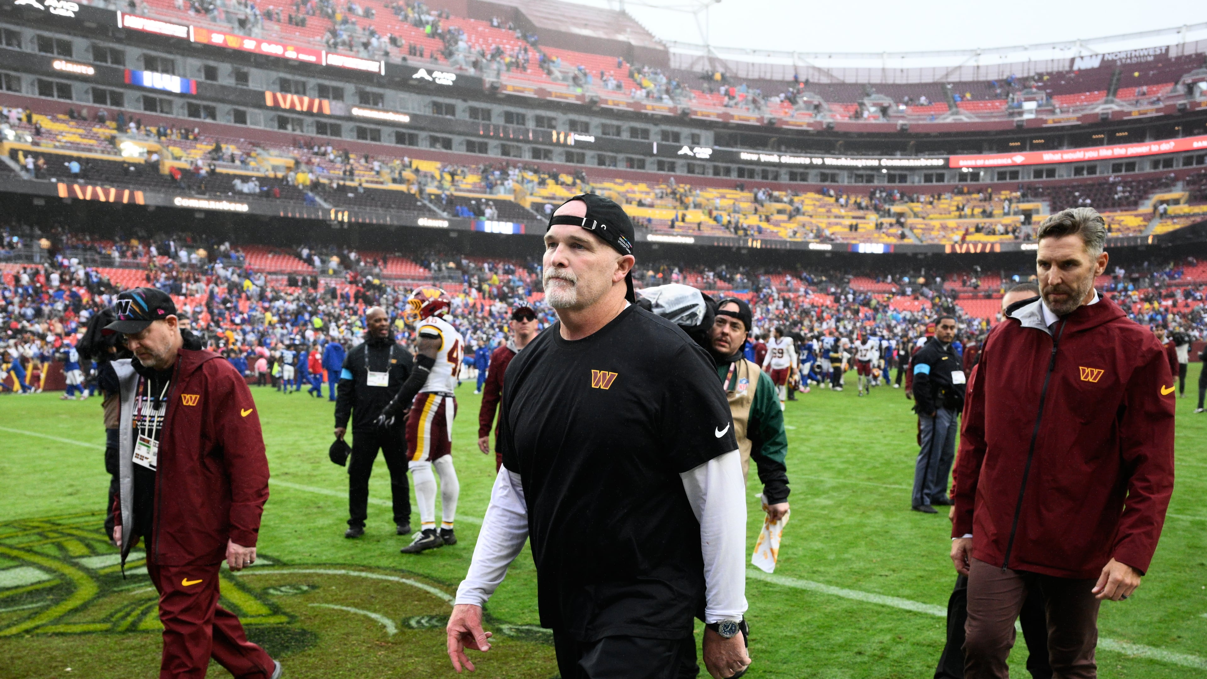 Washington Commanders head coach Dan Quinn leaves the field after an NFL football game against the New York Giants in Landover, Md., Sunday, Oct. 11, 2026. (AP Photo/Nick Wass)