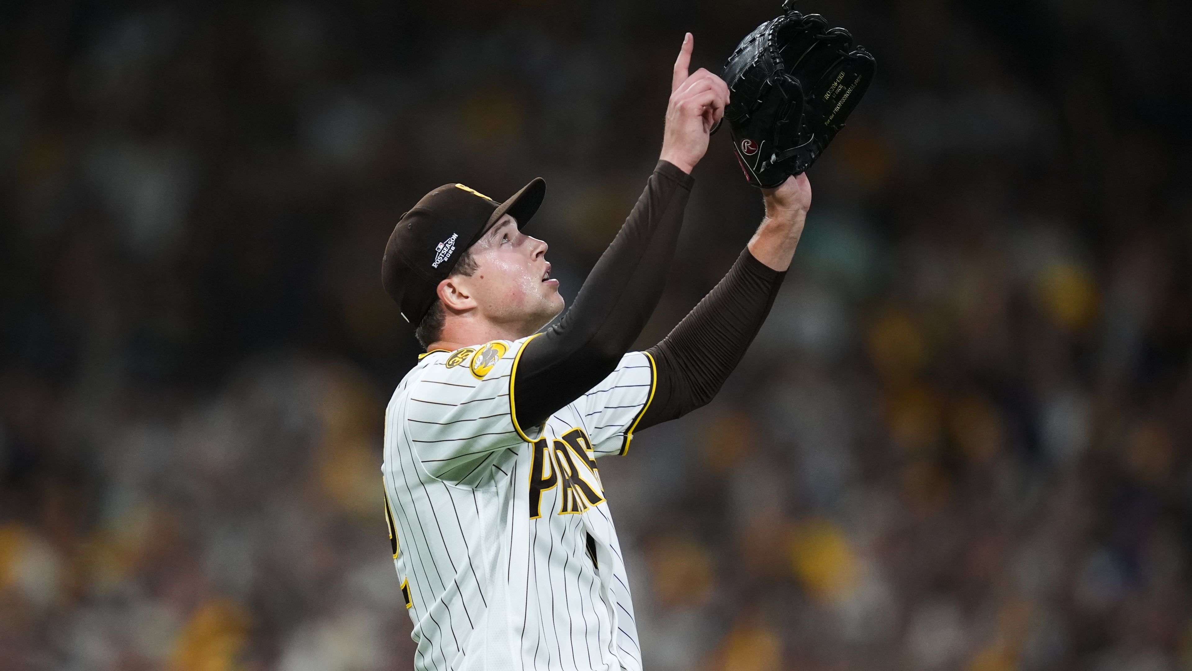 San Diego Padres pitcher Mason Miller reacts after defeating the Chicago Cubs in Game 2 of the National League Wild Card baseball playoff series Wednesday, Sept. 30, 2026, in San Diego. (AP Photo/Gregory Bull)