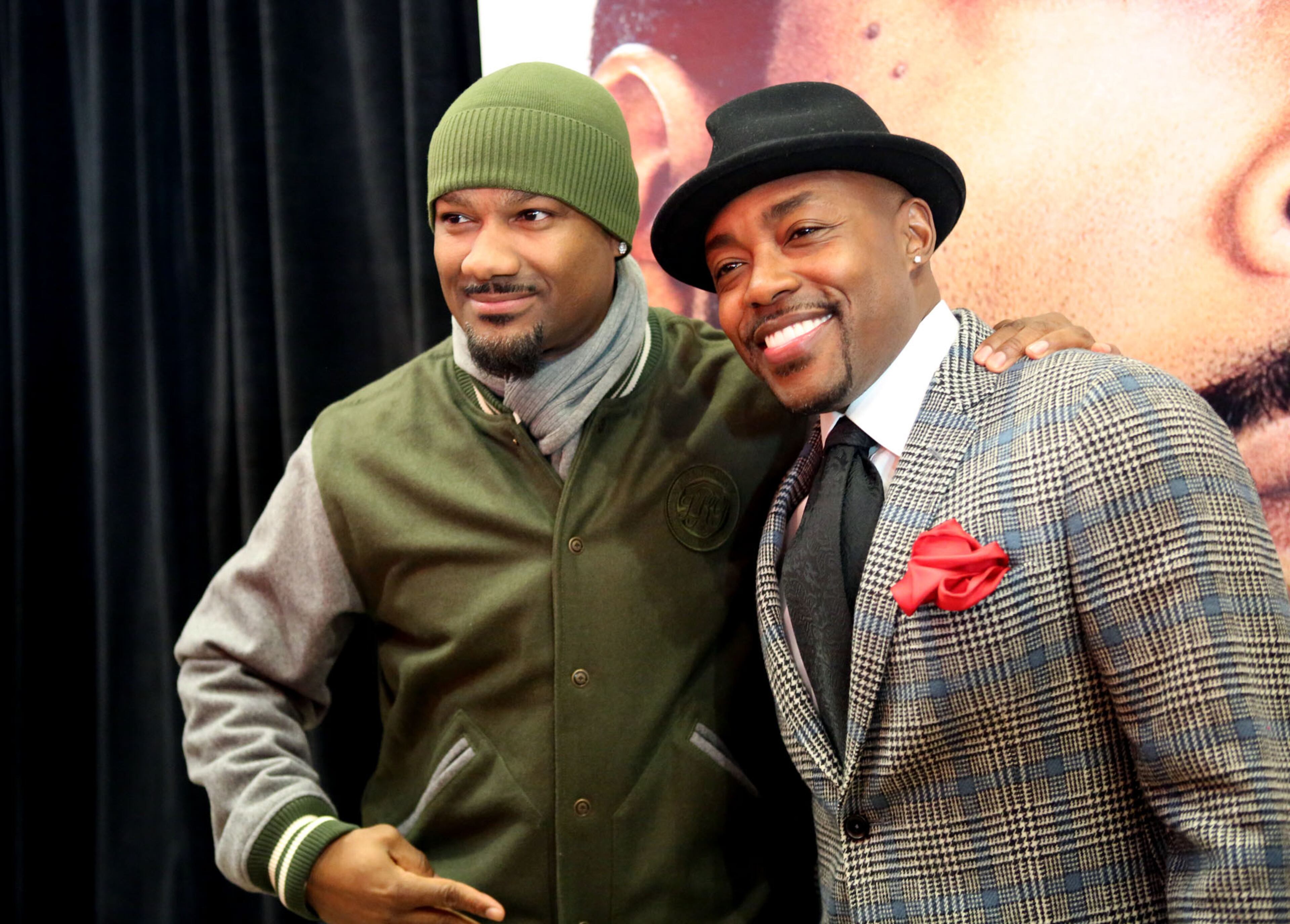 Big Tigger, left, cast member and V-103 personality poses on the red carpet for the premier of comedy action film "Ride Along," at the Atlantic Station Regal Theater in Atlanta Monday, Jan. 6, 2014.