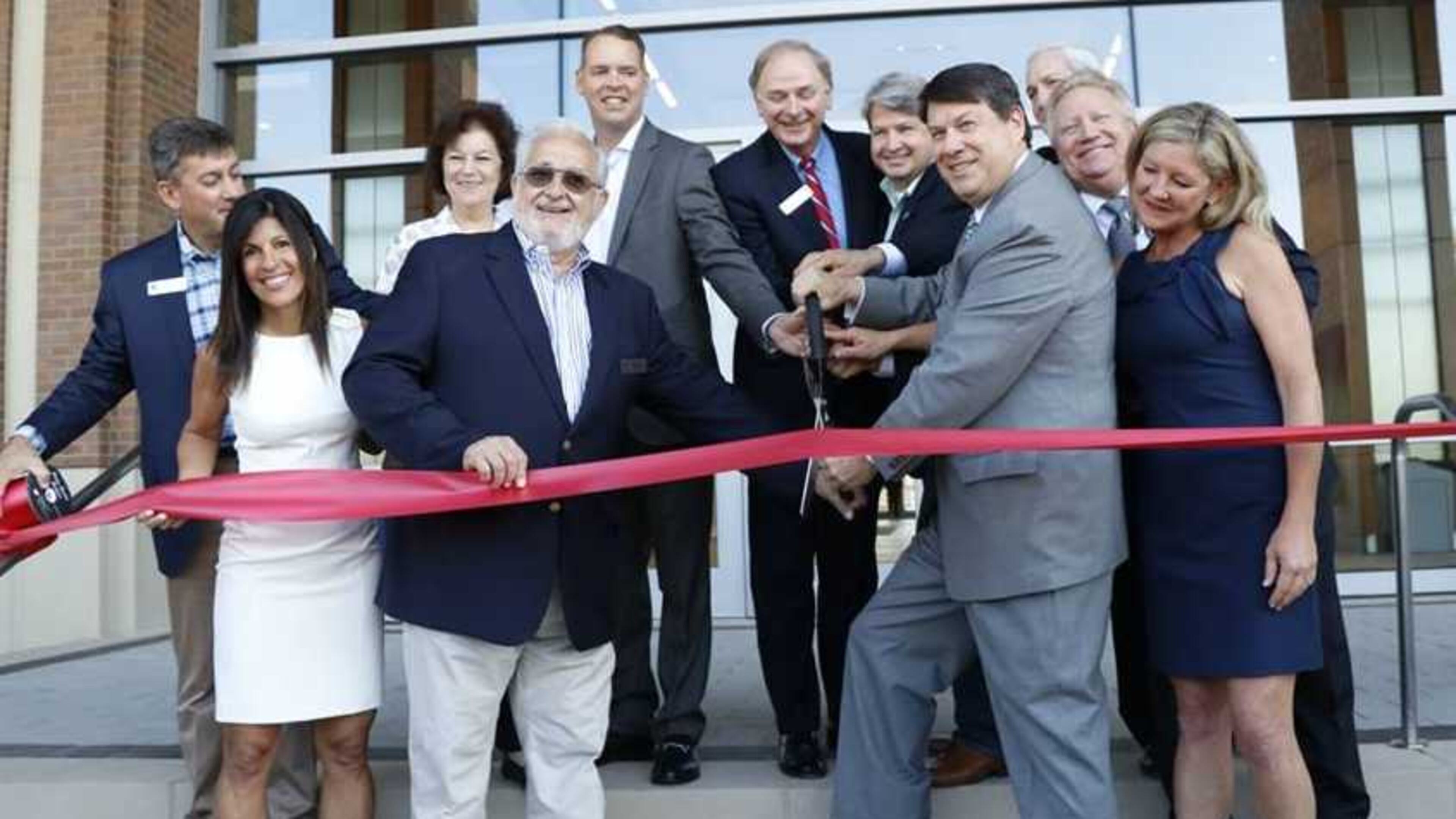 On Monday, city leaders and more than 500 people attended a ribbon cutting ceremony at the new mixed-use City Springs development, officially opening the new city hall at 1 Galambos Way.